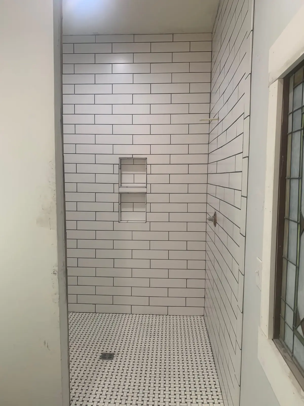 Subway Tile Showers with Leaded-Glass Window