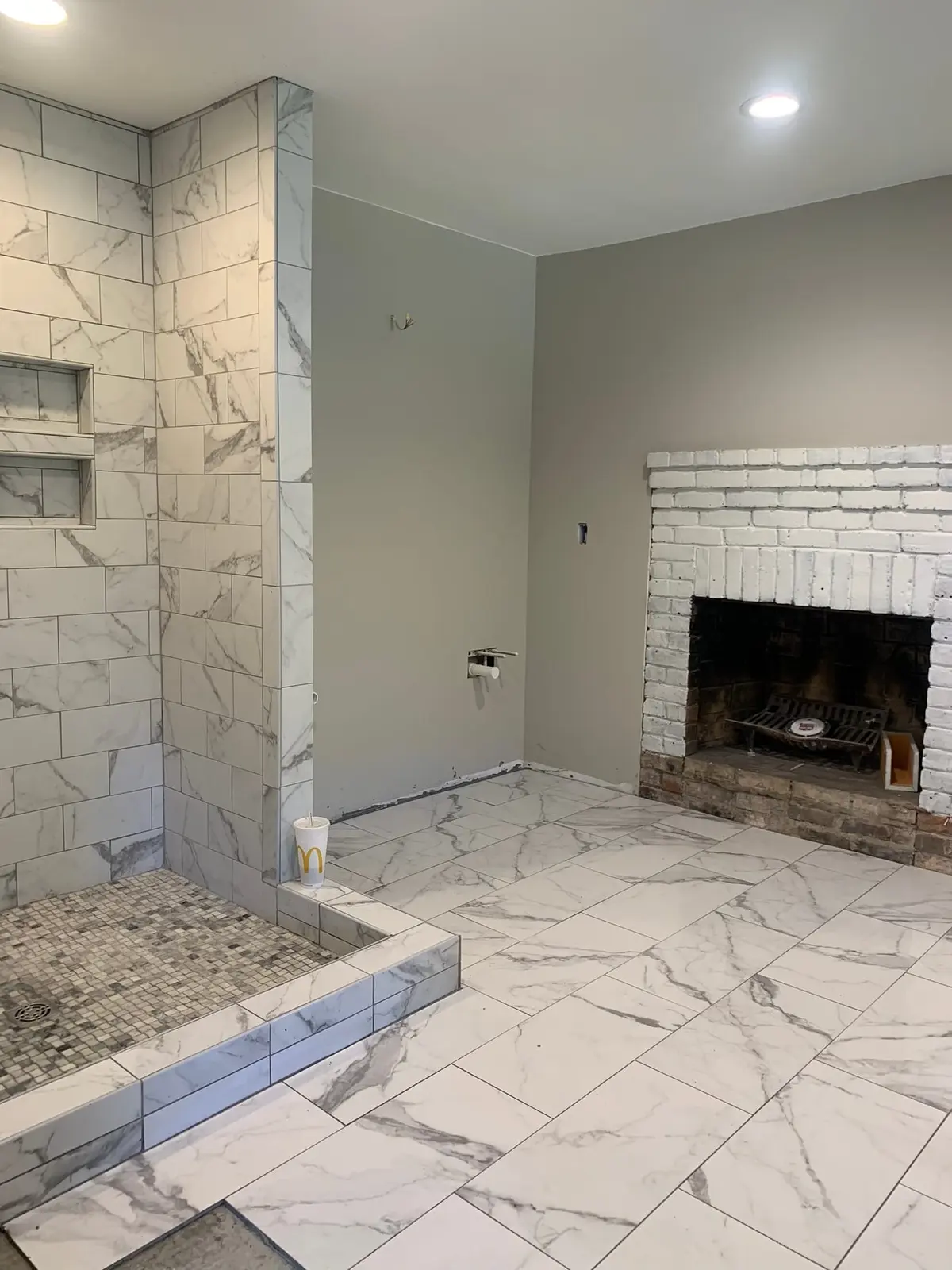 Marble-Look Bath with Fireplace