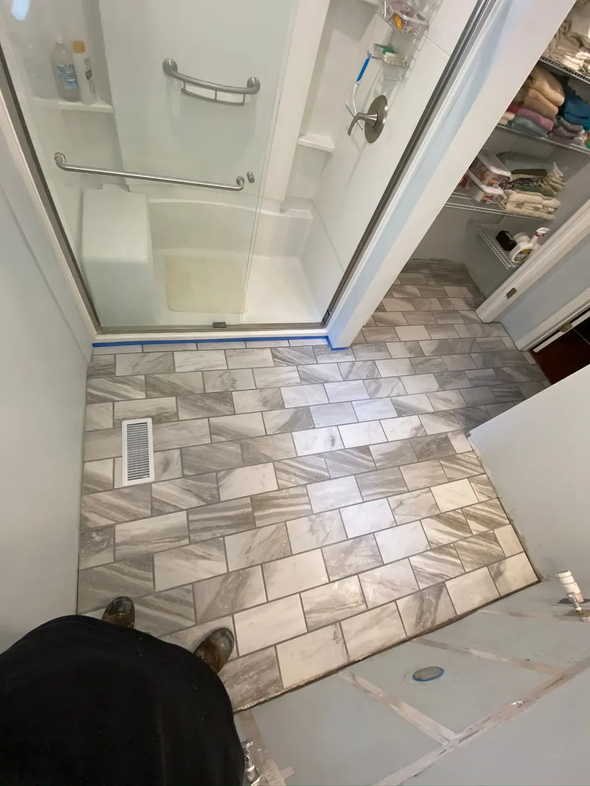 Marble-look bathroom floor tile
