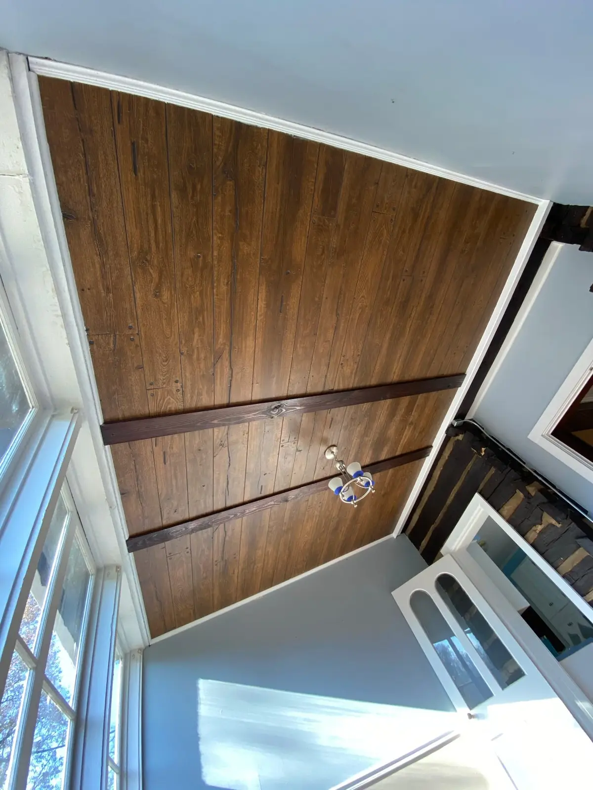 Sunroom Dark Plank Floor — finished photo 6