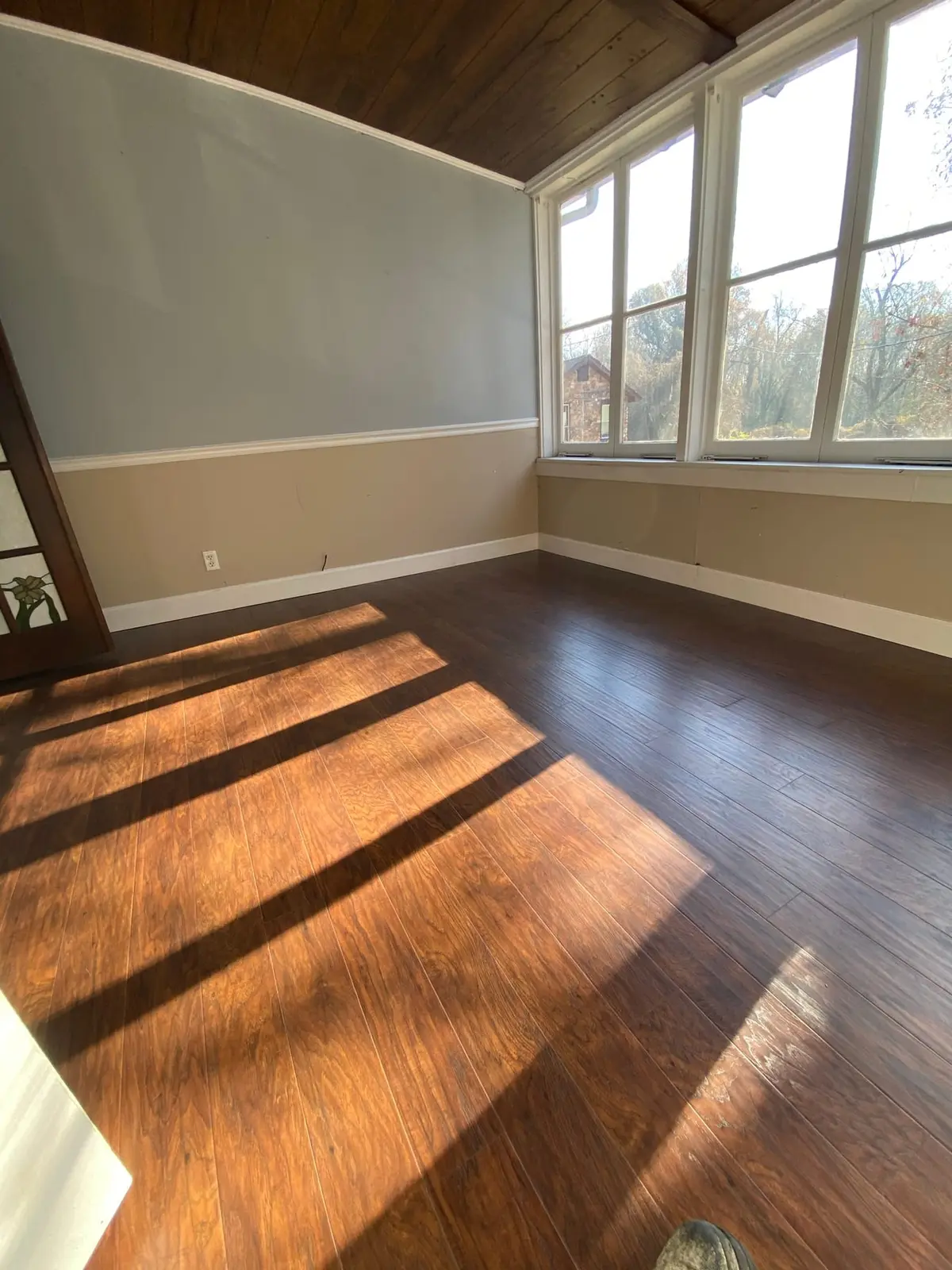 Sunroom Dark Plank Floor