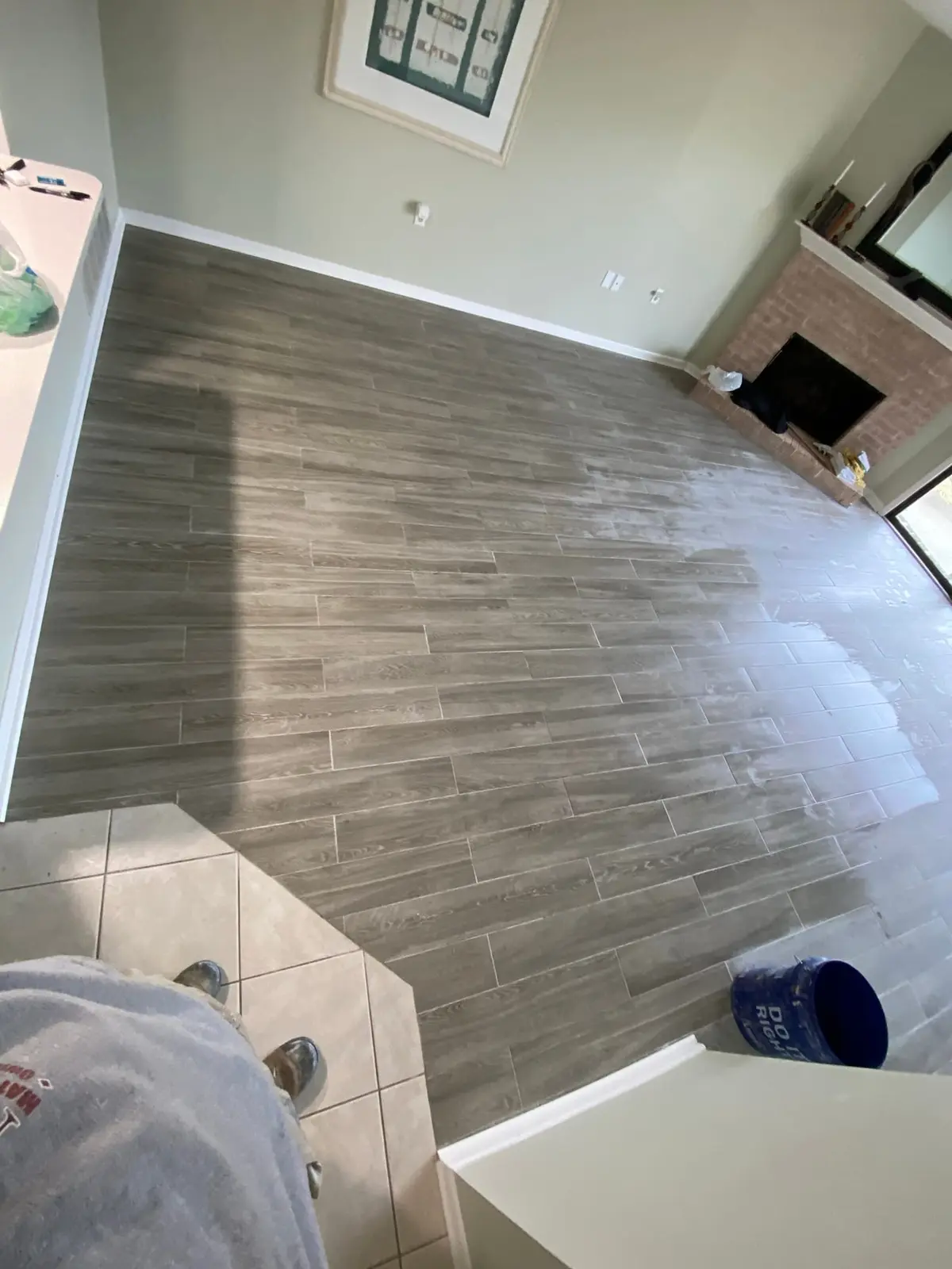 Living Room Wood-Look Floor with Brick Fireplace
