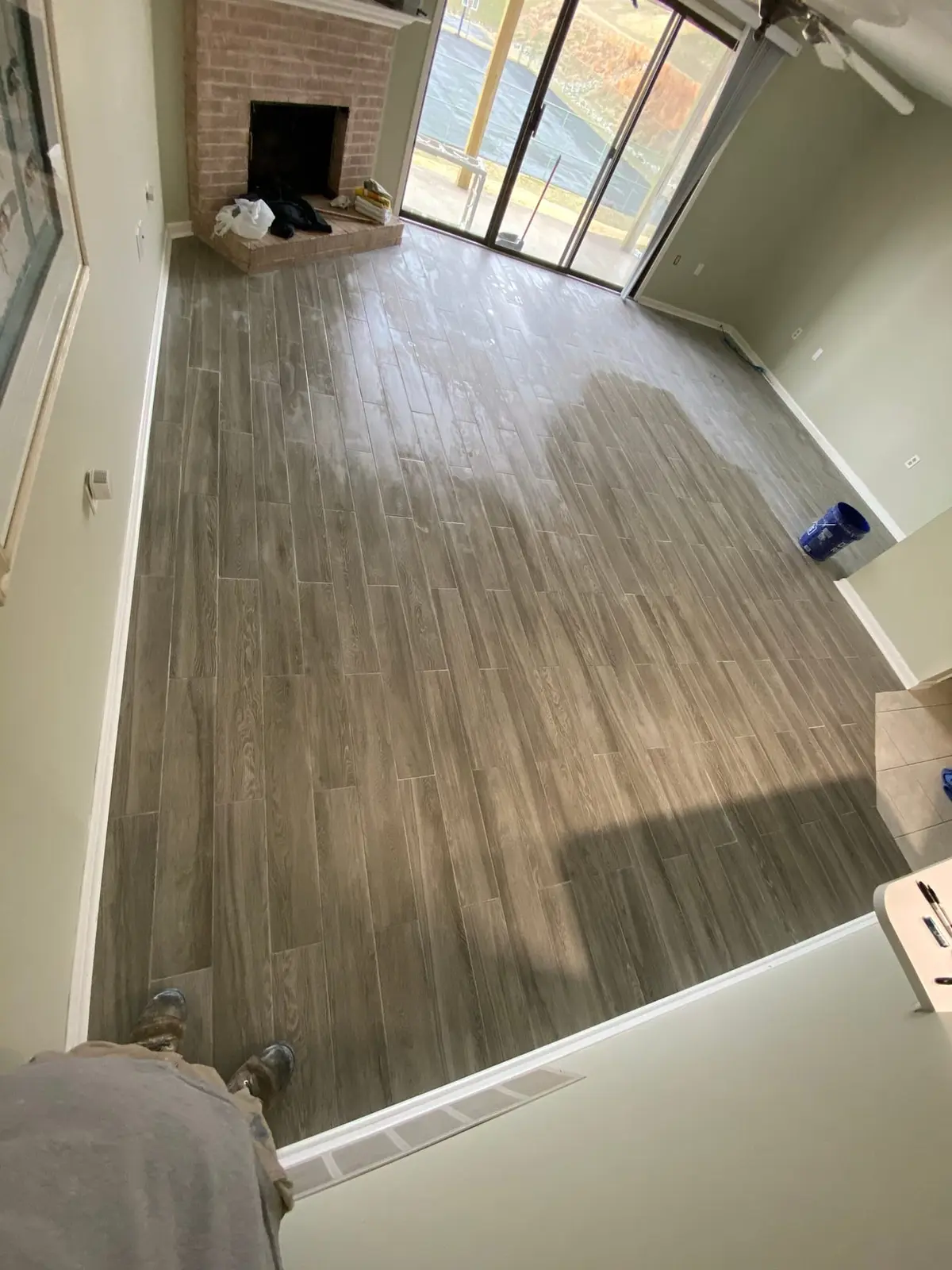 Living Room Wood-Look Floor with Brick Fireplace — finished photo 2
