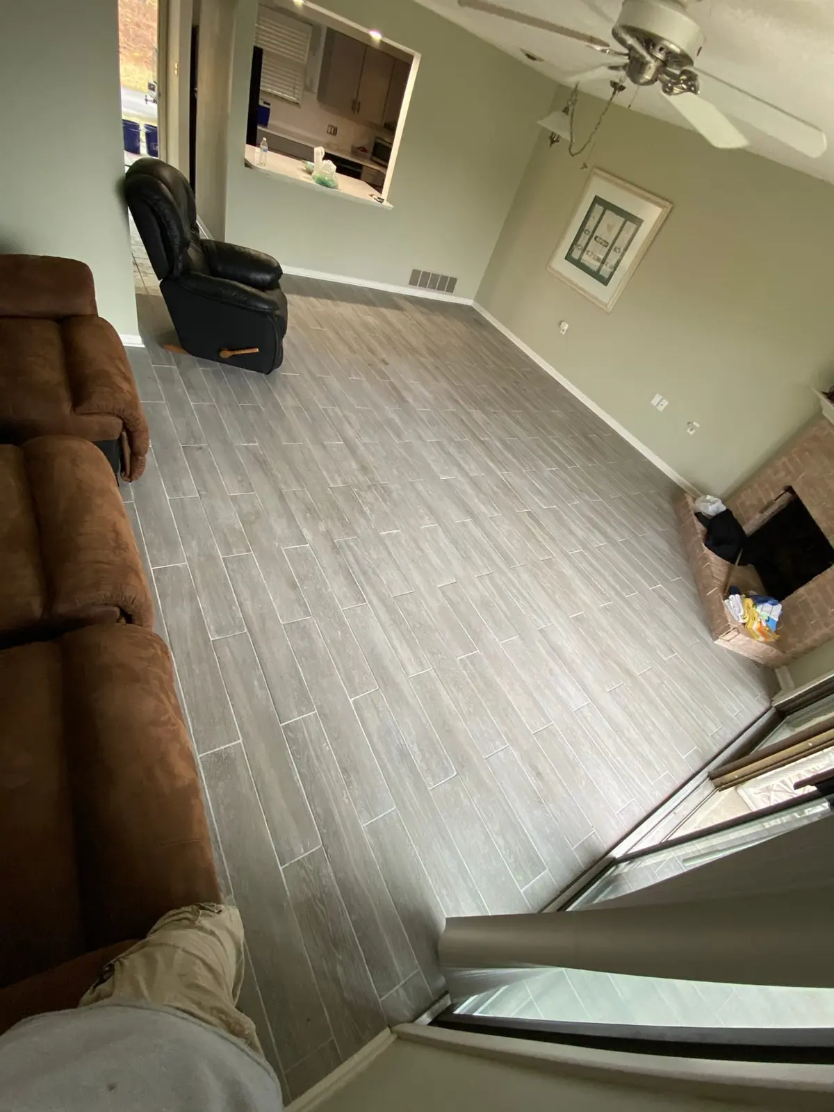 Living Room Wood-Look Floor with Brick Fireplace — finished photo 4