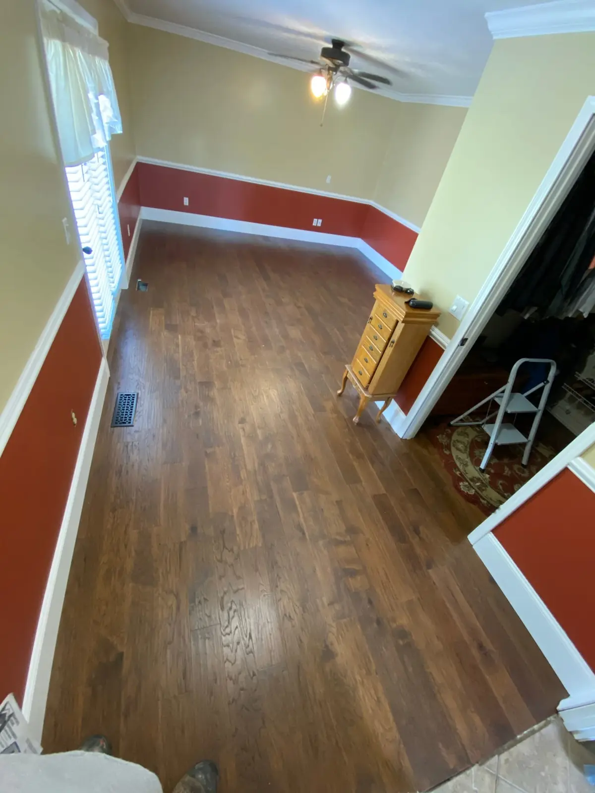 Dark Plank Floors with Wainscot