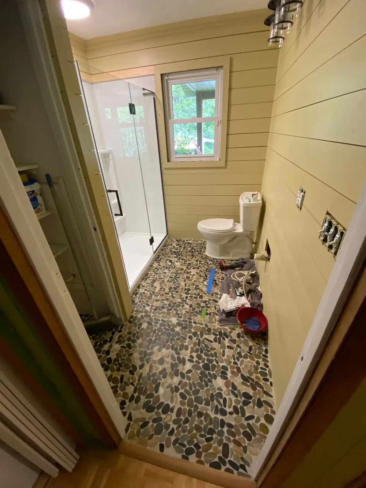 Shiplap Bath with Glass Shower and Pebble Floor — finished photo 4