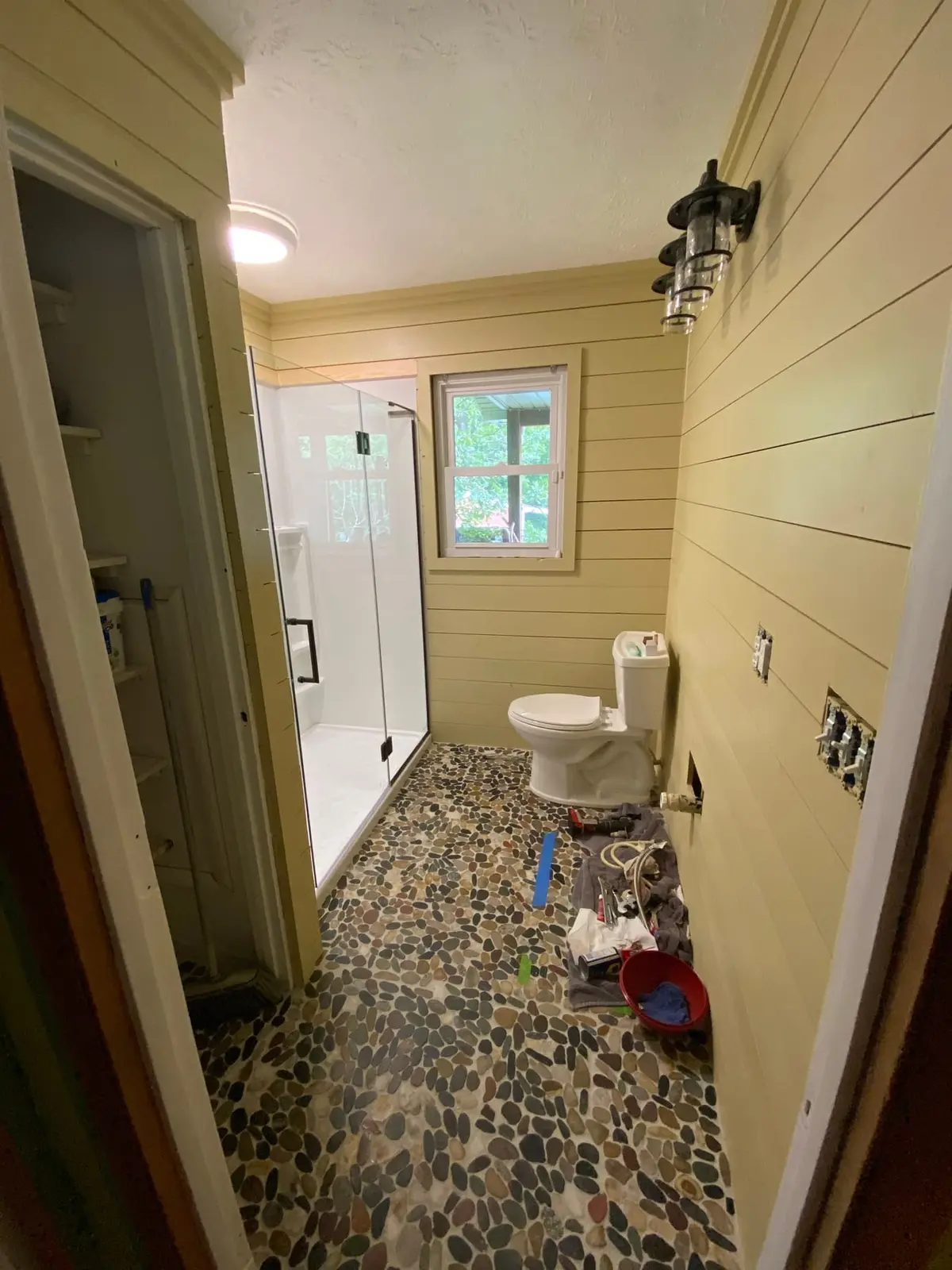 Shiplap Bath with Glass Shower and Pebble Floor — finished photo 5