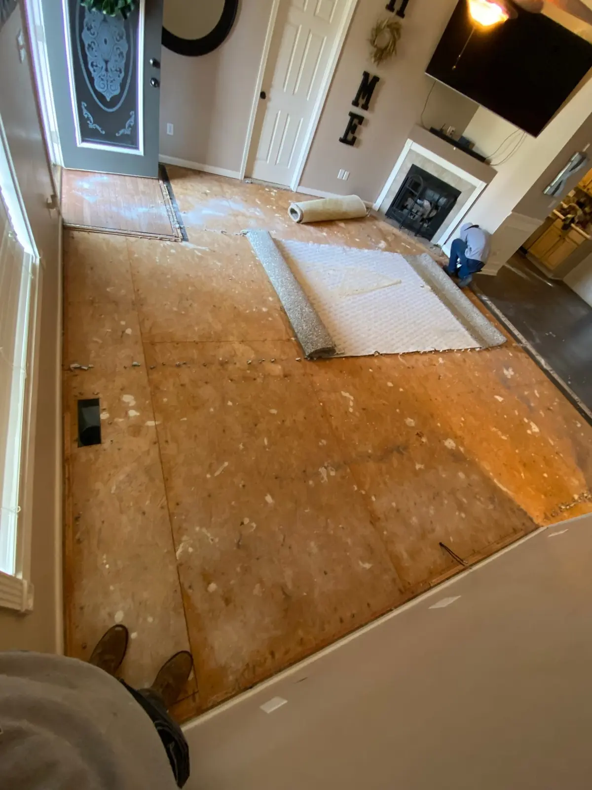 During work — Living Areas Plank Floor in Occupied Home