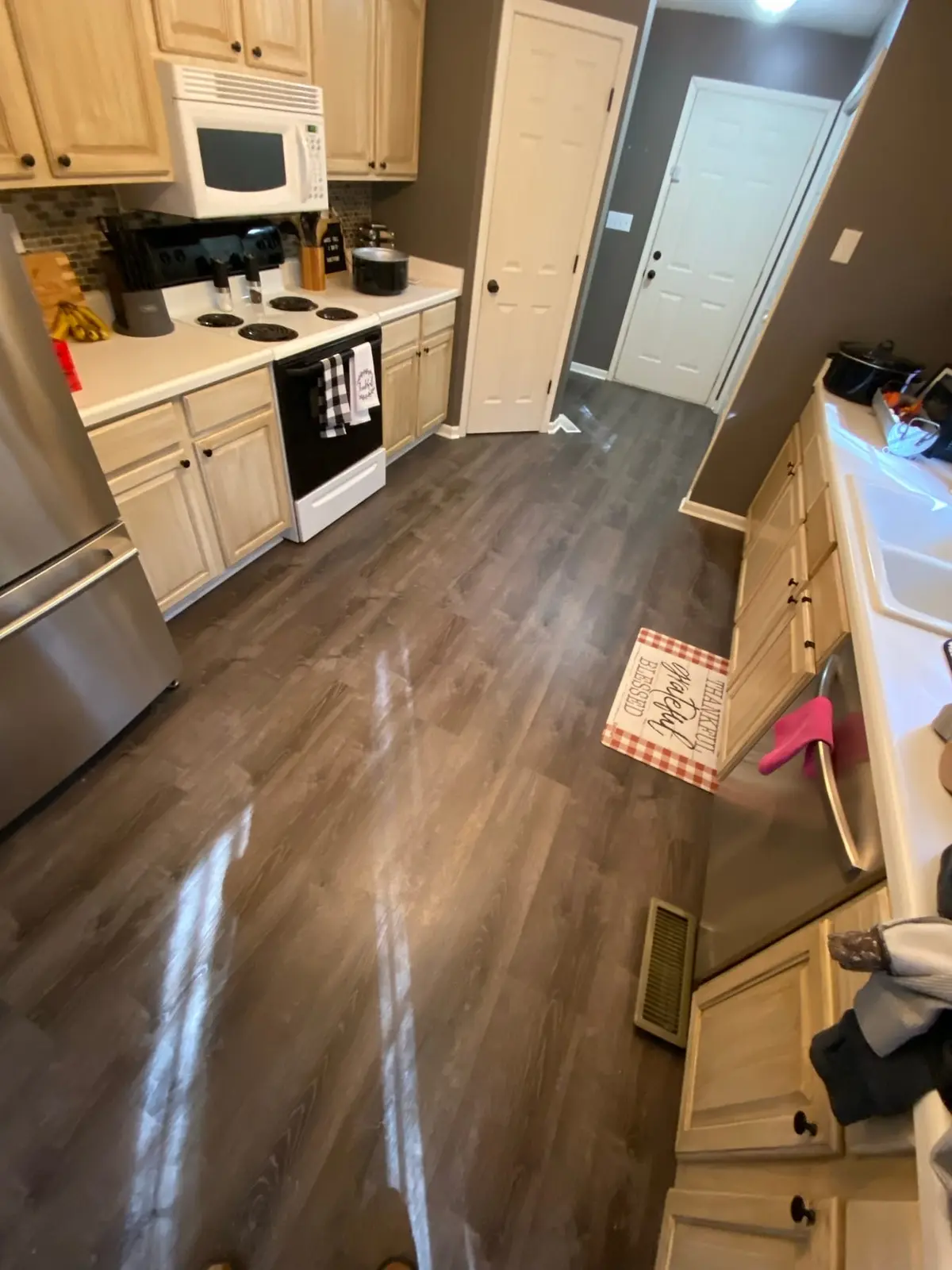Living Areas Plank Floor in Occupied Home — finished photo 4