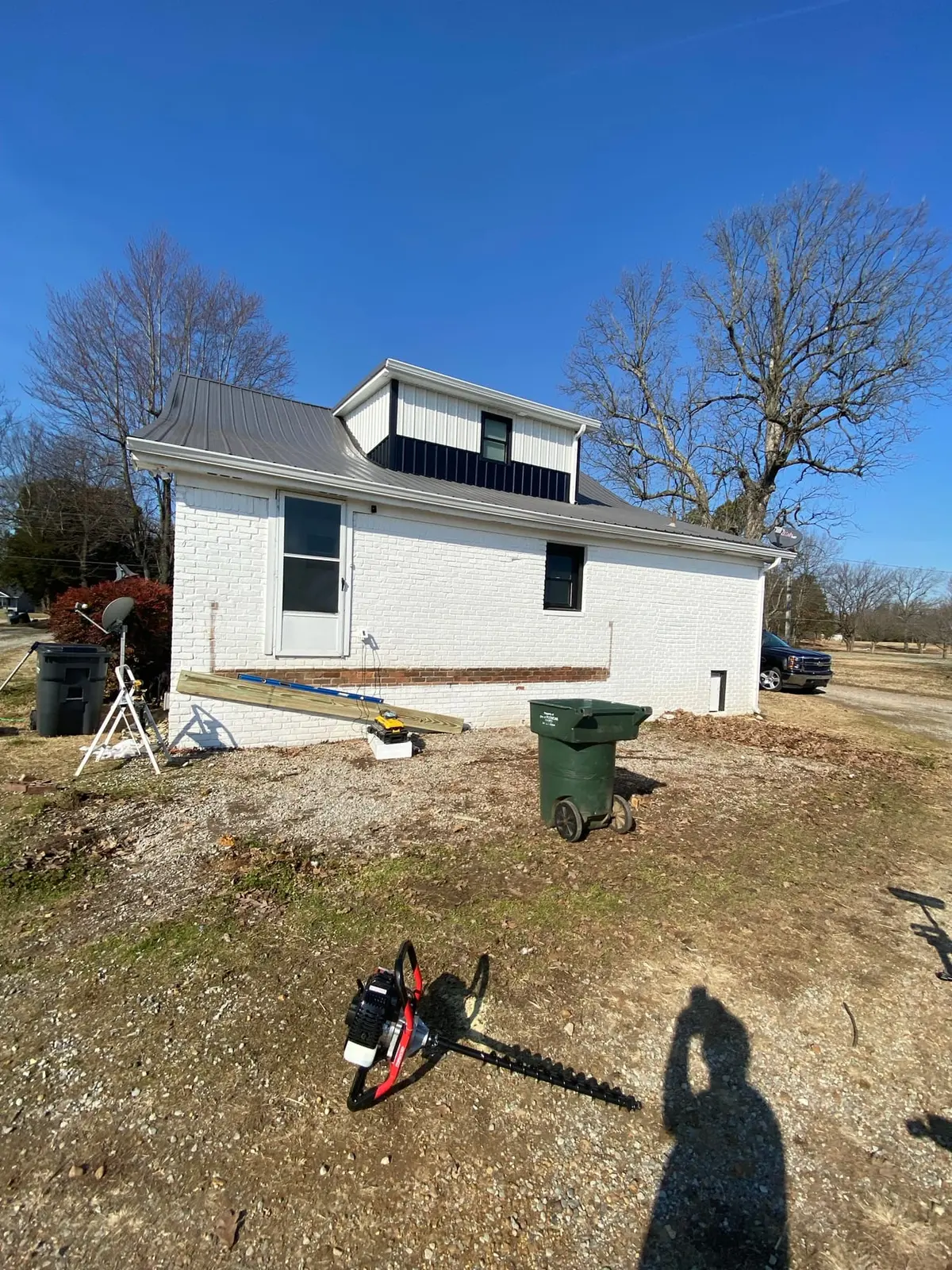 Before — New Wood Deck on Painted Brick House