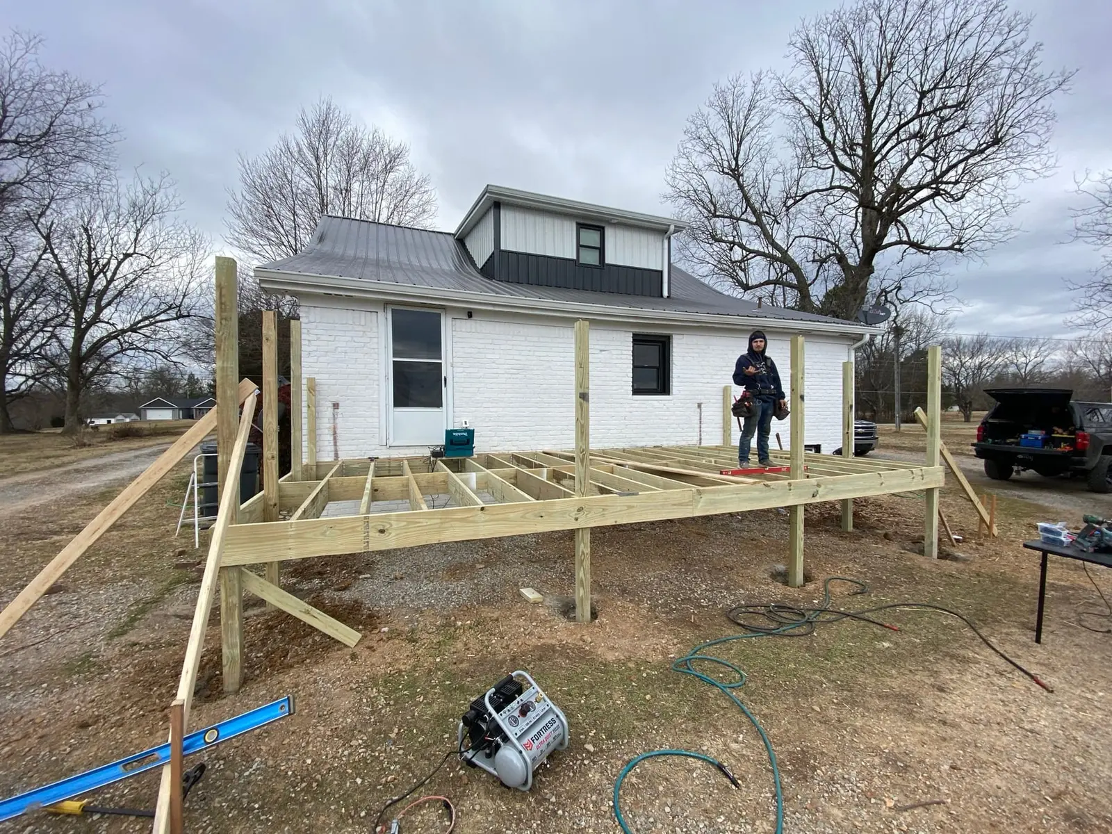 New Wood Deck on Painted Brick House — Progress photo 1