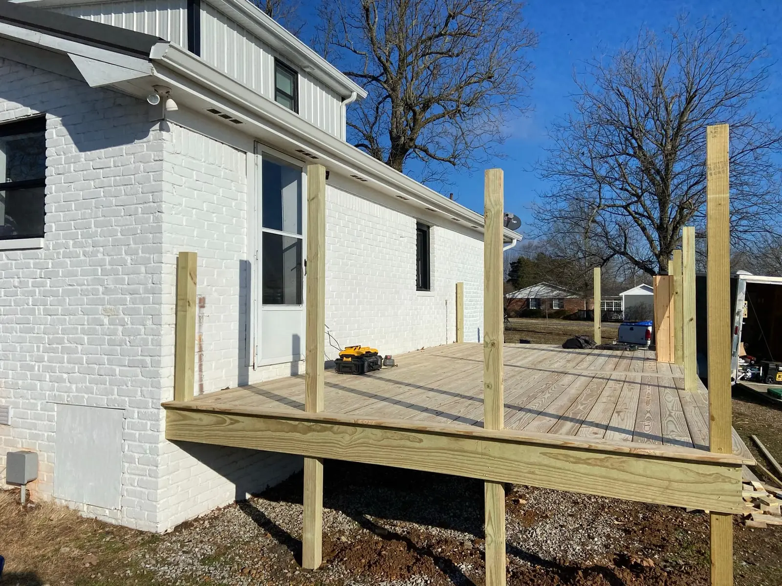 New Wood Deck on Painted Brick House