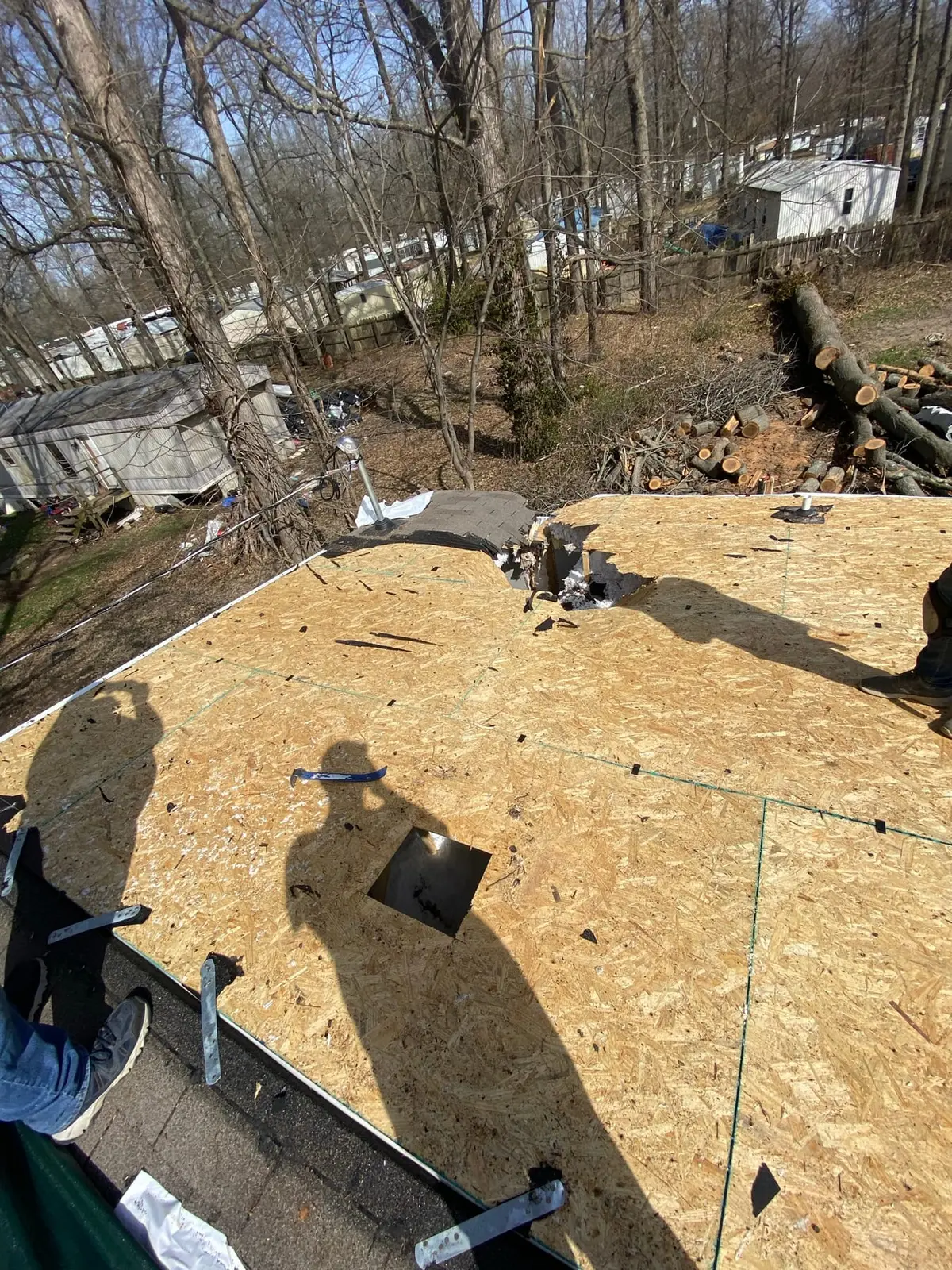 Storm Damage Roof Rebuild After Tree Fall — Progress photo 1