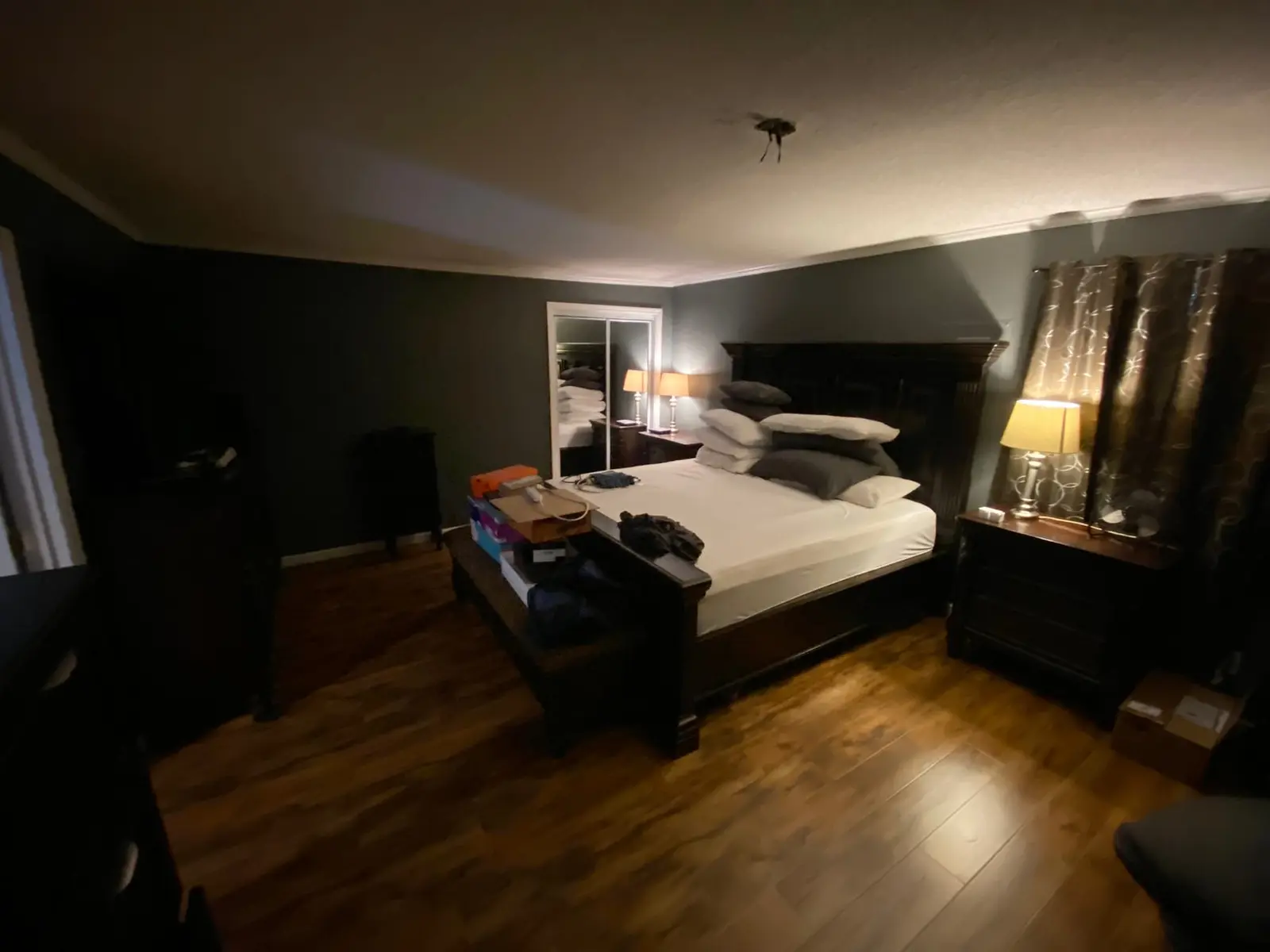 Charcoal Bedroom with New Plank Floor — finished photo 9