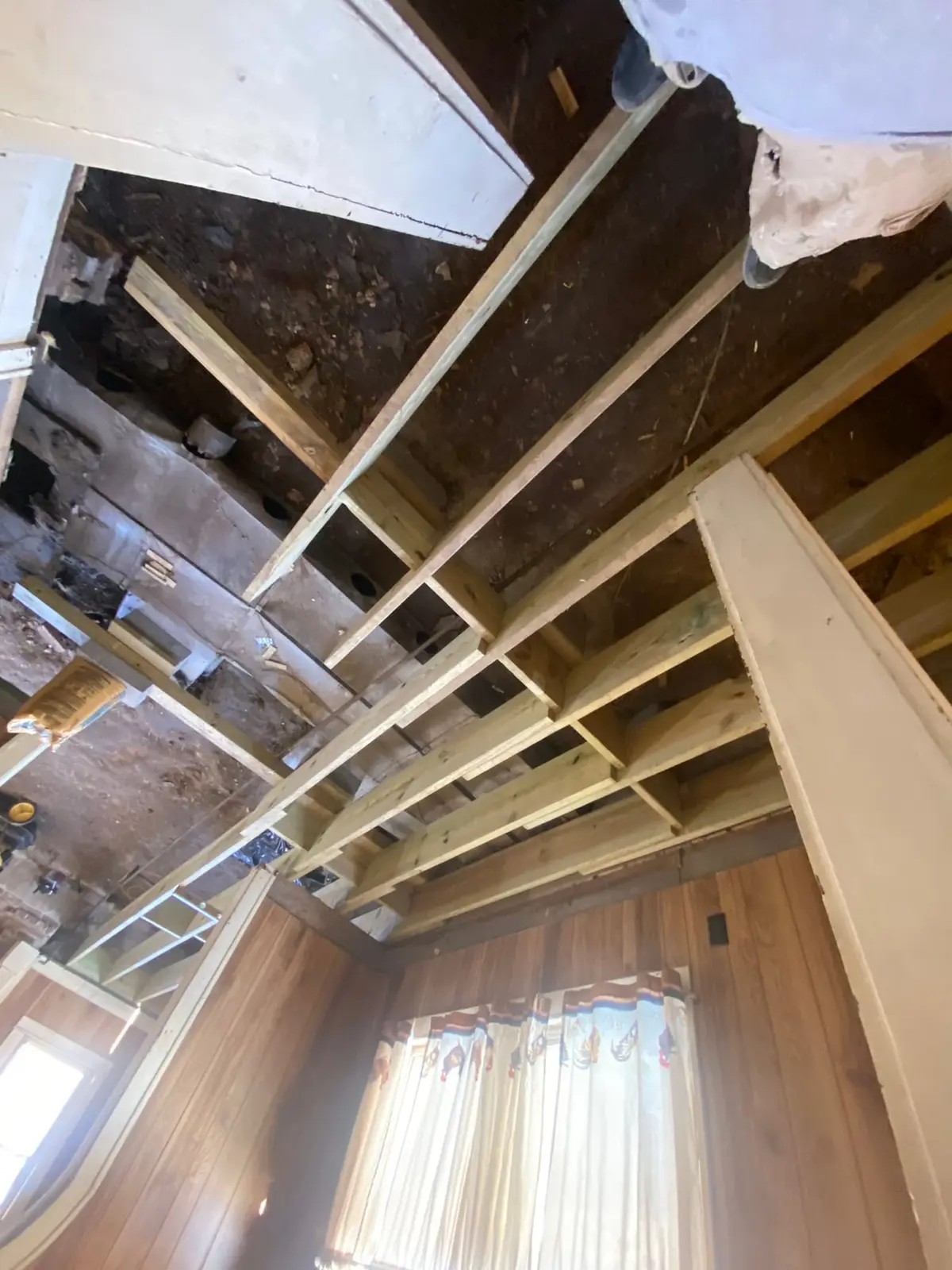 Floor Joist Rebuild in Wood-Paneled House — progress photo 3
