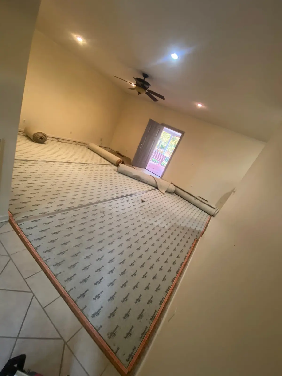 New Floors, Paint and Stacked-Stone Fireplace — Before photo 1