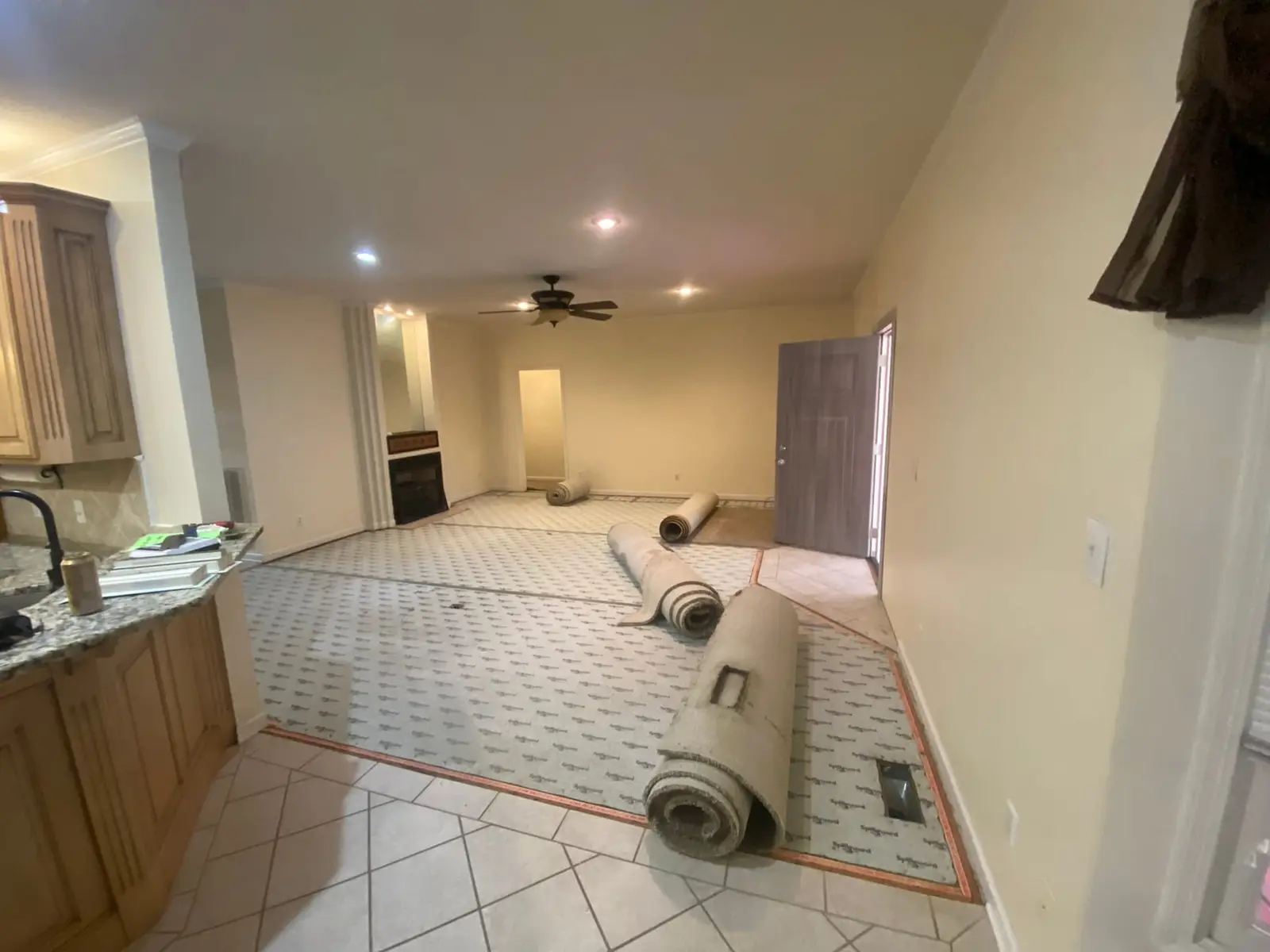 New Floors, Paint and Stacked-Stone Fireplace — Before photo 3