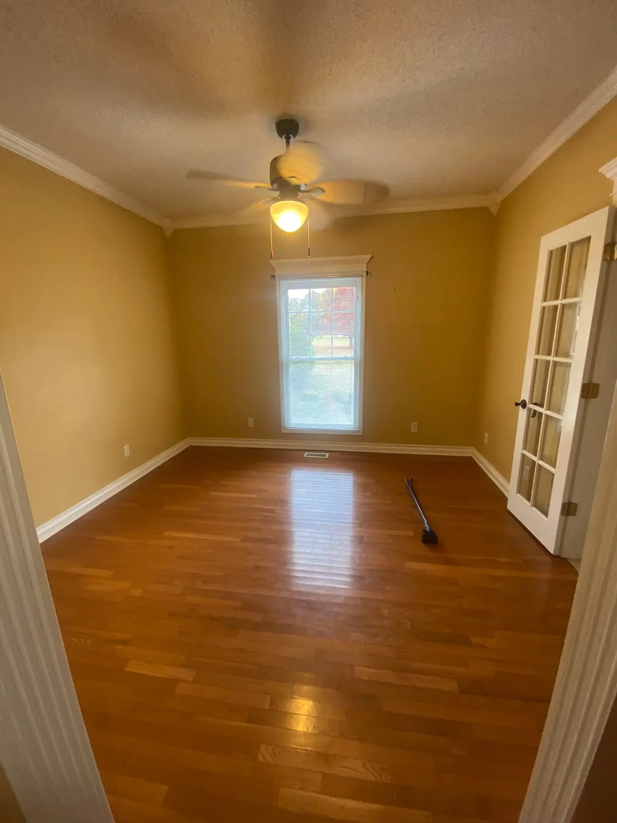 New Floors, Paint and Stacked-Stone Fireplace — Before photo 10