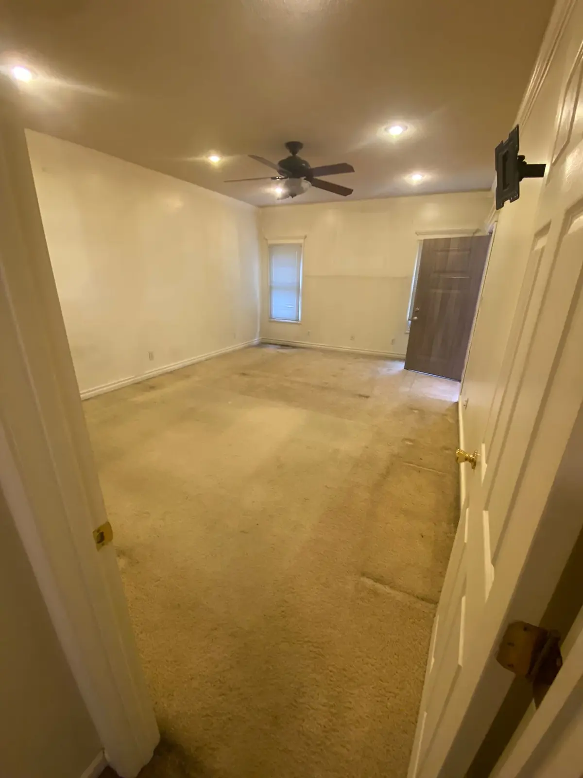 New Floors, Paint and Stacked-Stone Fireplace — Before photo 13