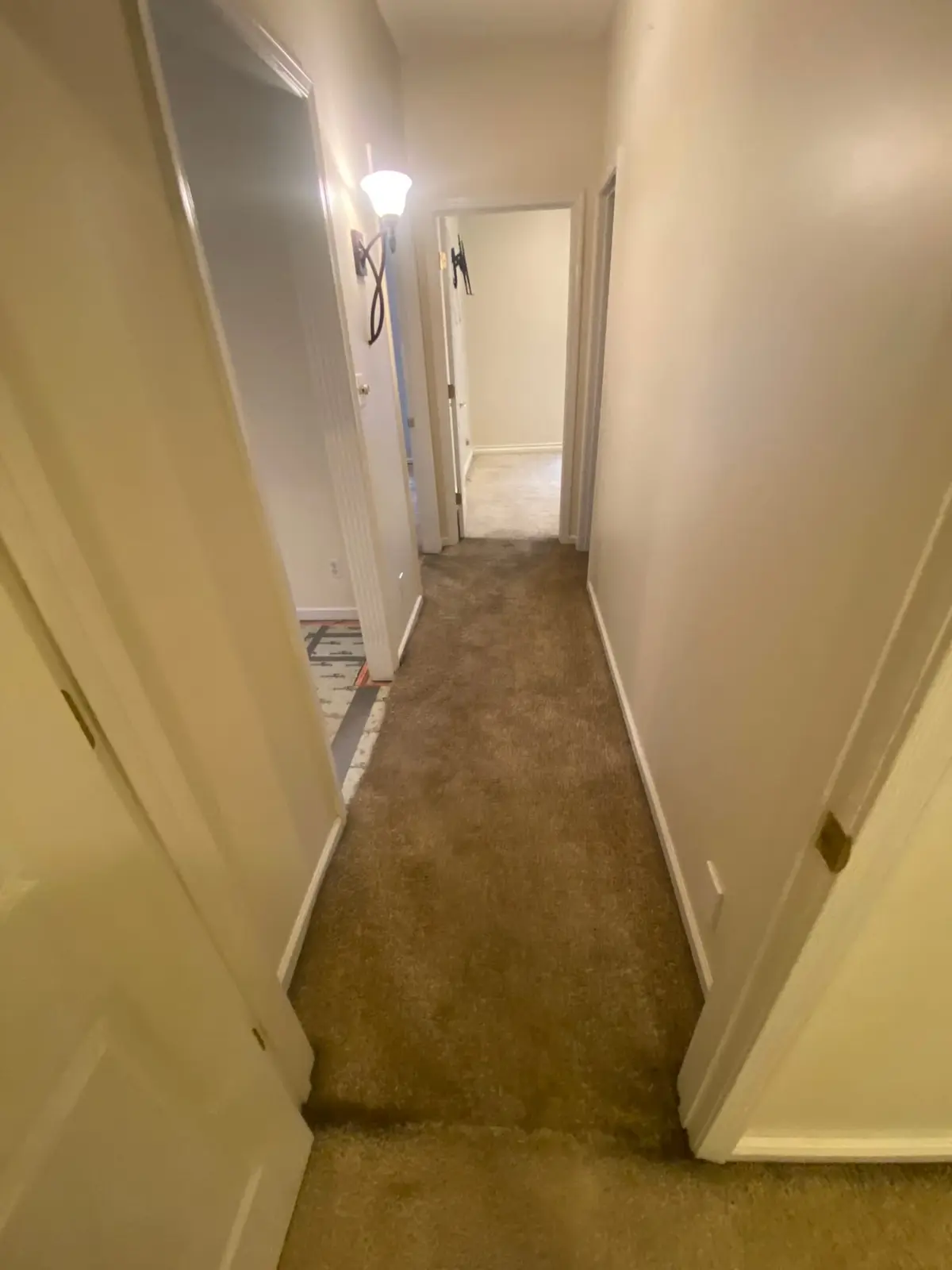 Before — New Floors, Paint and Stacked-Stone Fireplace