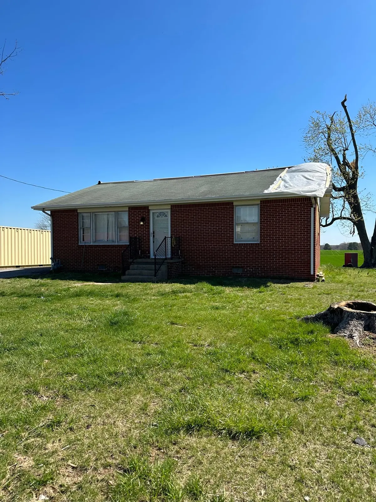 Storm-Damaged Brick Ranch Rebuilt with New Addition — Before photo 14