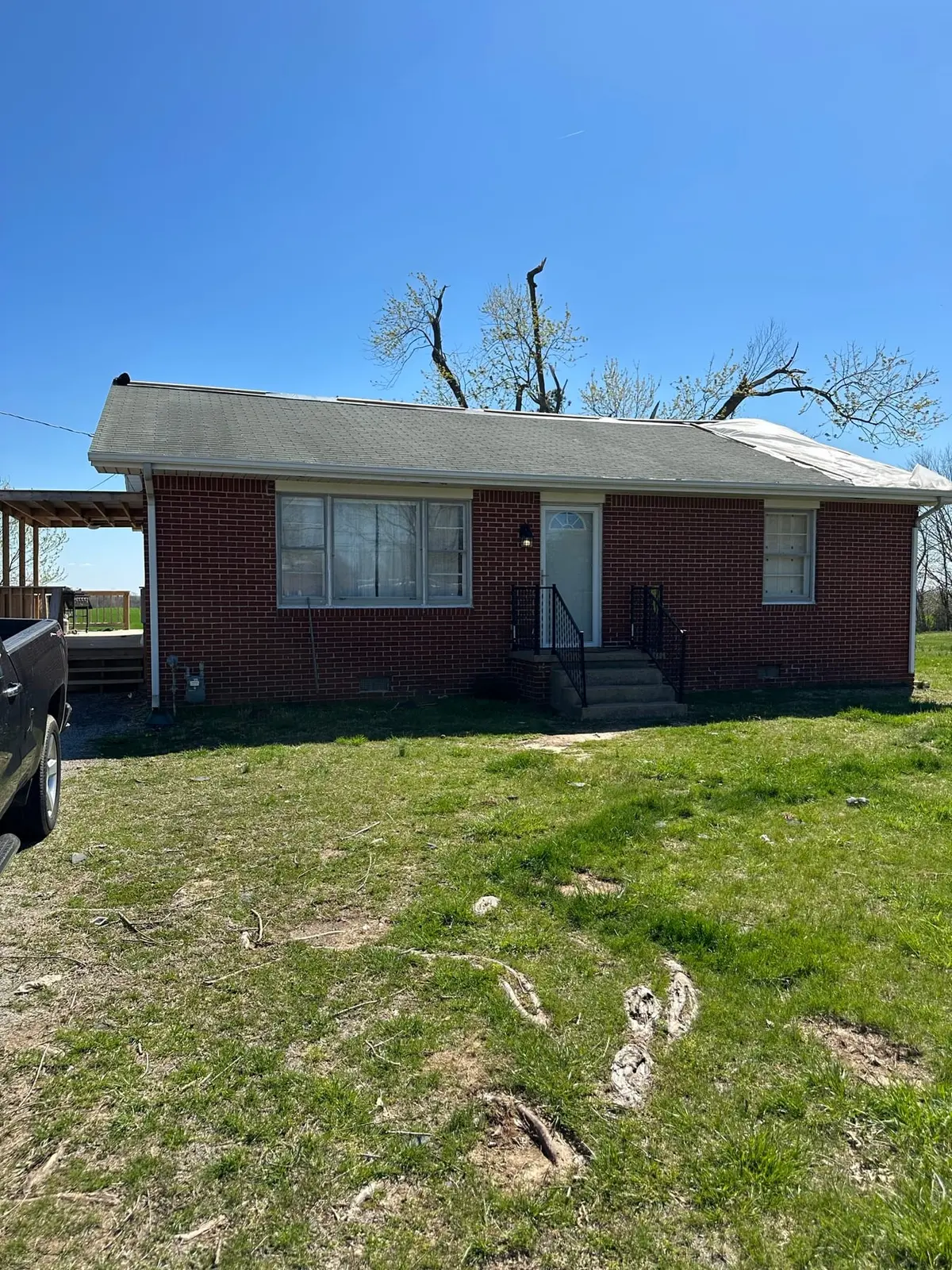Storm-Damaged Brick Ranch Rebuilt with New Addition — Before photo 15