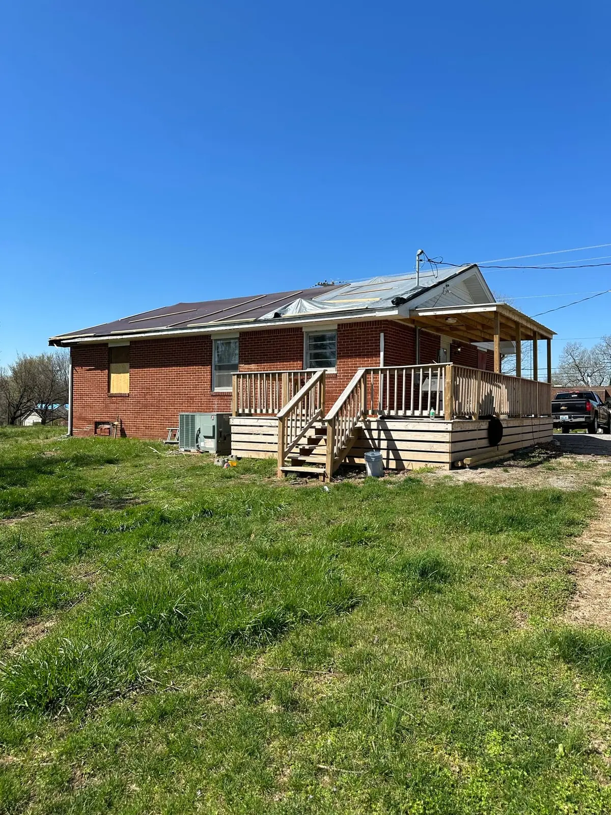 Storm-Damaged Brick Ranch Rebuilt with New Addition — Before photo 19