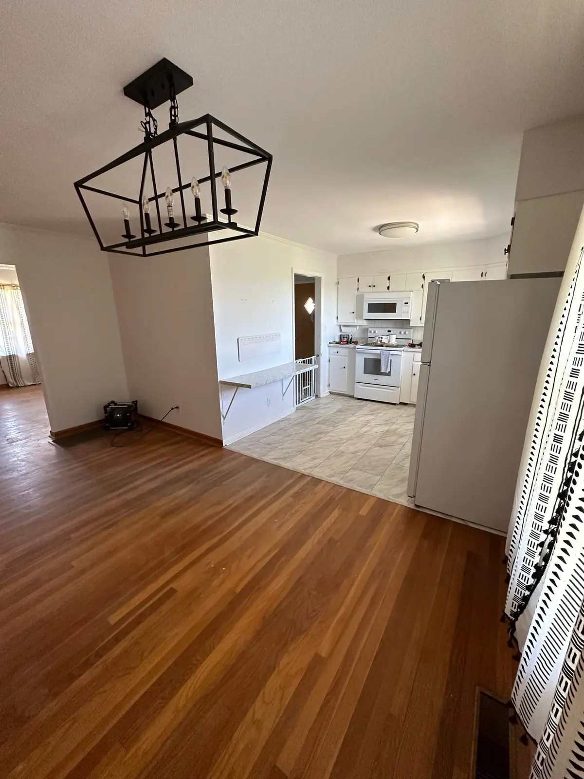 Storm-Damaged Brick Ranch Rebuilt with New Addition — Before photo 23