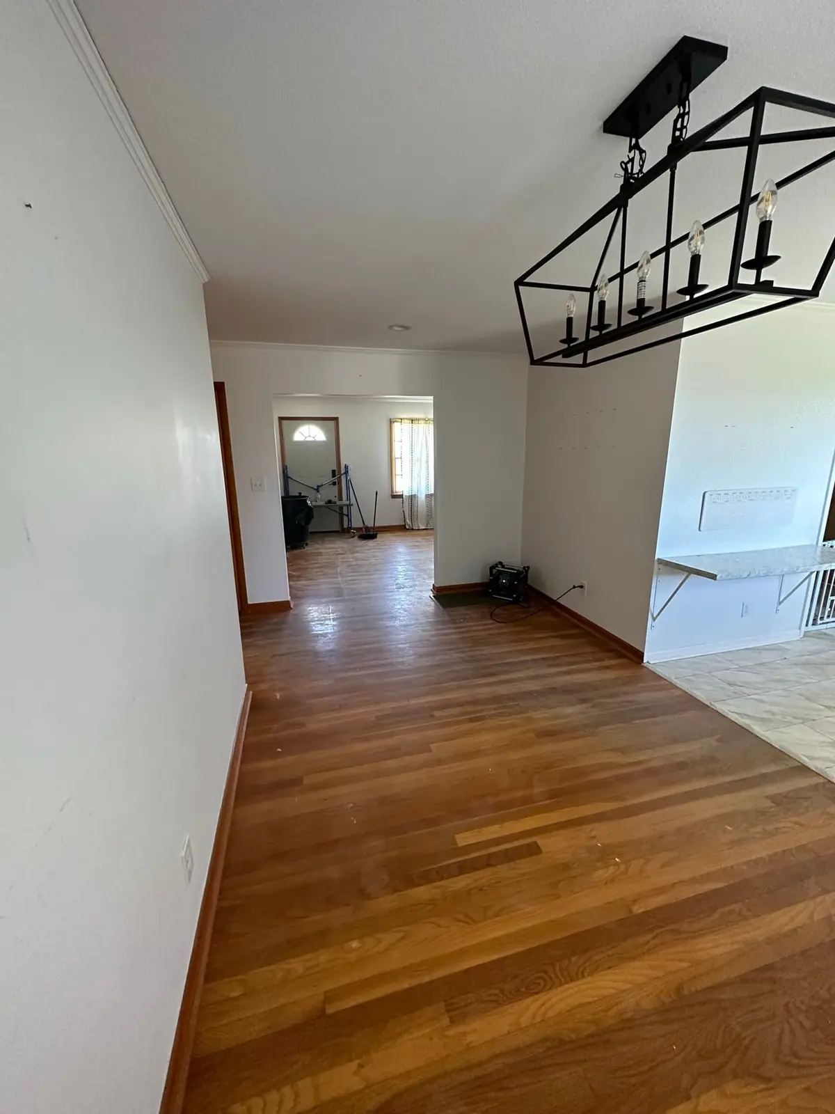 Storm-Damaged Brick Ranch Rebuilt with New Addition — Before photo 24