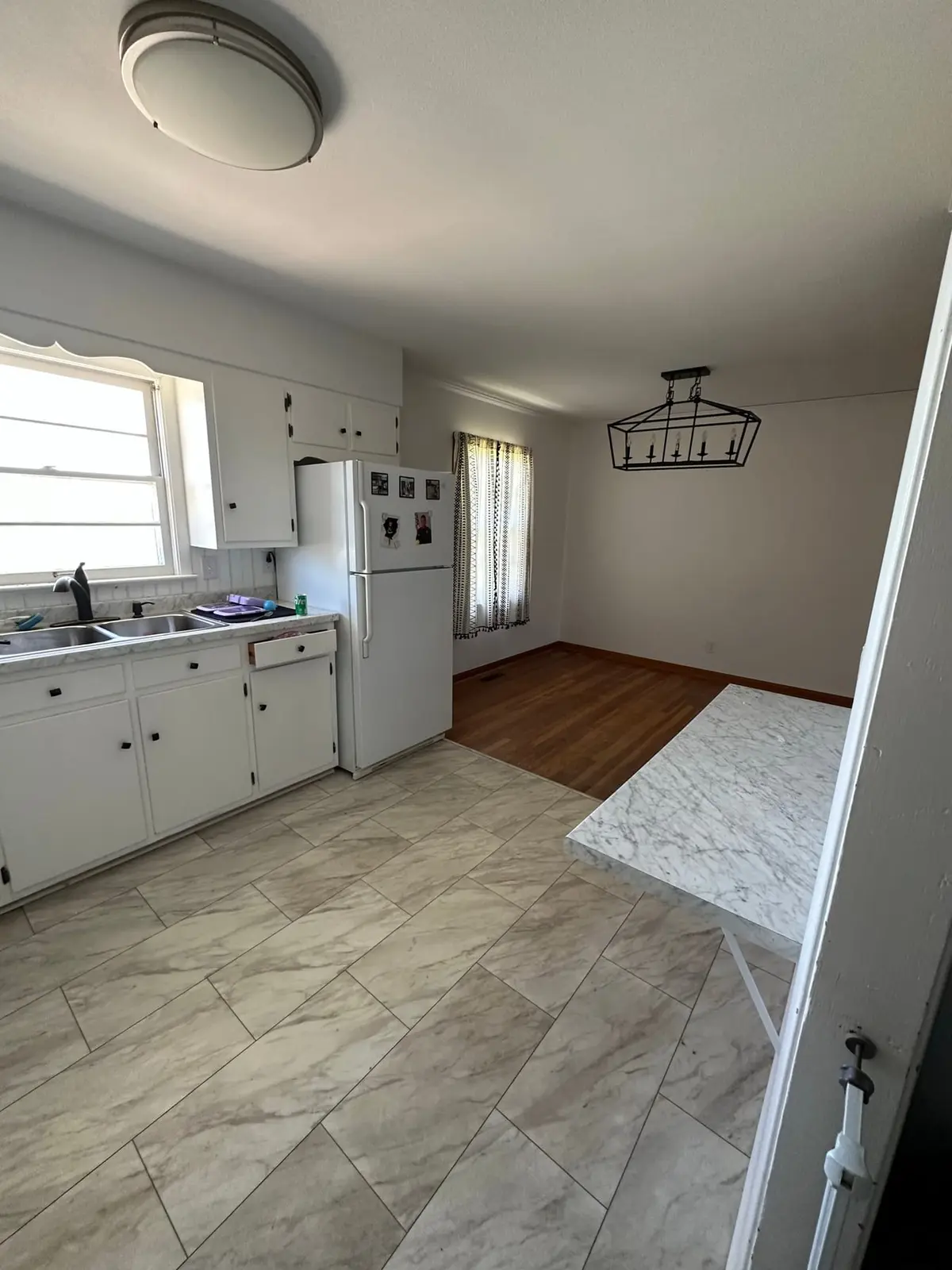 Storm-Damaged Brick Ranch Rebuilt with New Addition — Before photo 27