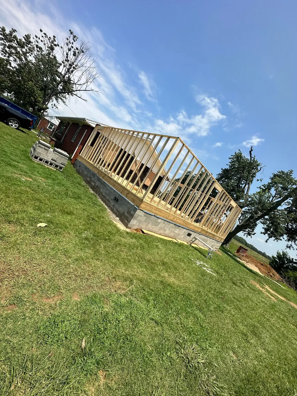 Storm-Damaged Brick Ranch Rebuilt with New Addition — Progress photo 35