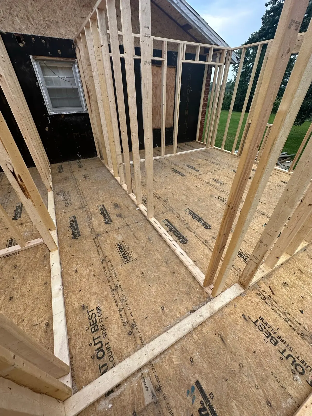 Storm-Damaged Brick Ranch Rebuilt with New Addition — Progress photo 39