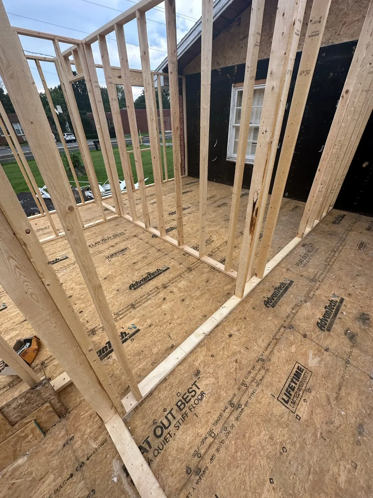 Storm-Damaged Brick Ranch Rebuilt with New Addition — Progress photo 40