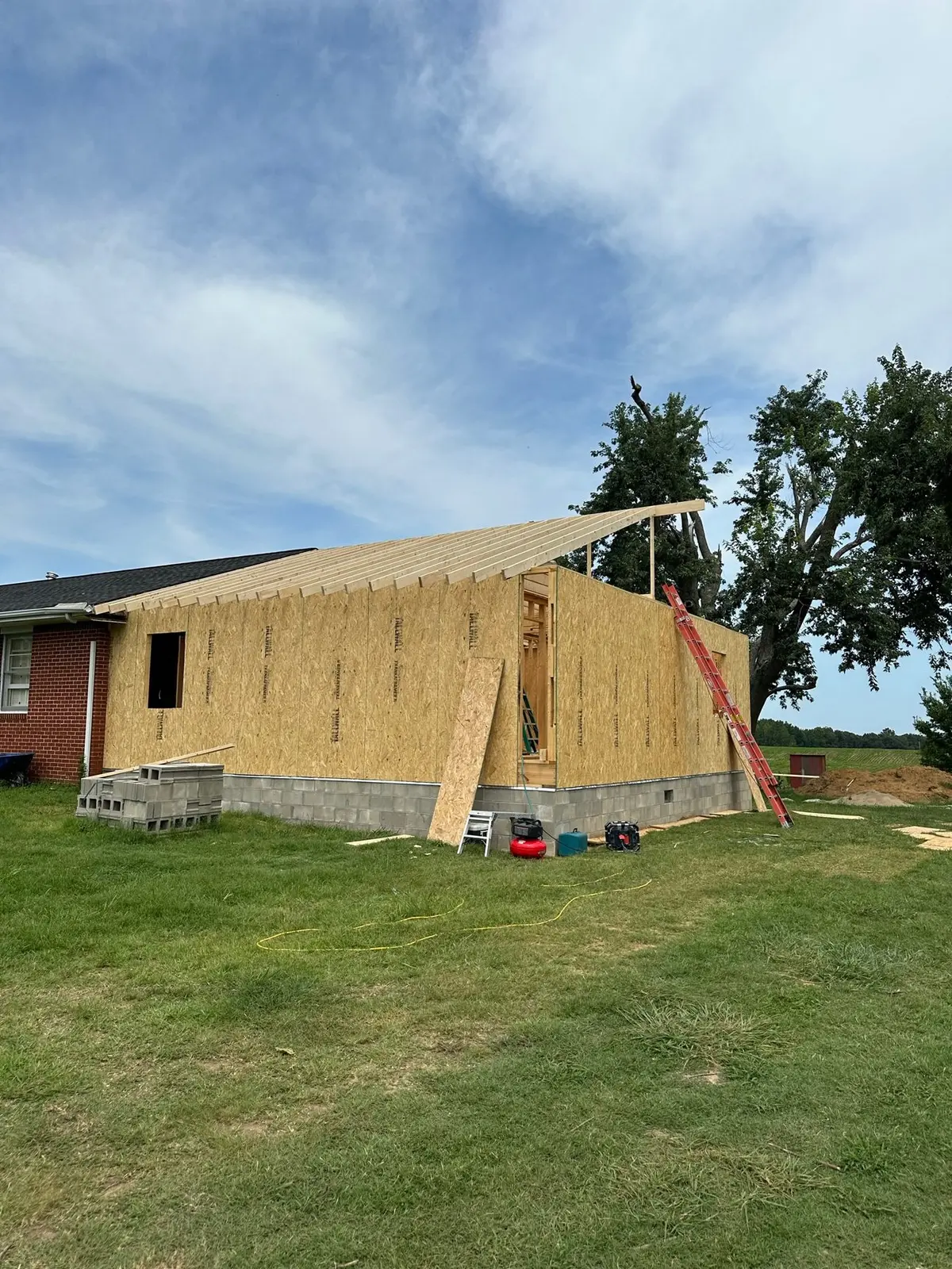 Storm-Damaged Brick Ranch Rebuilt with New Addition — Progress photo 46