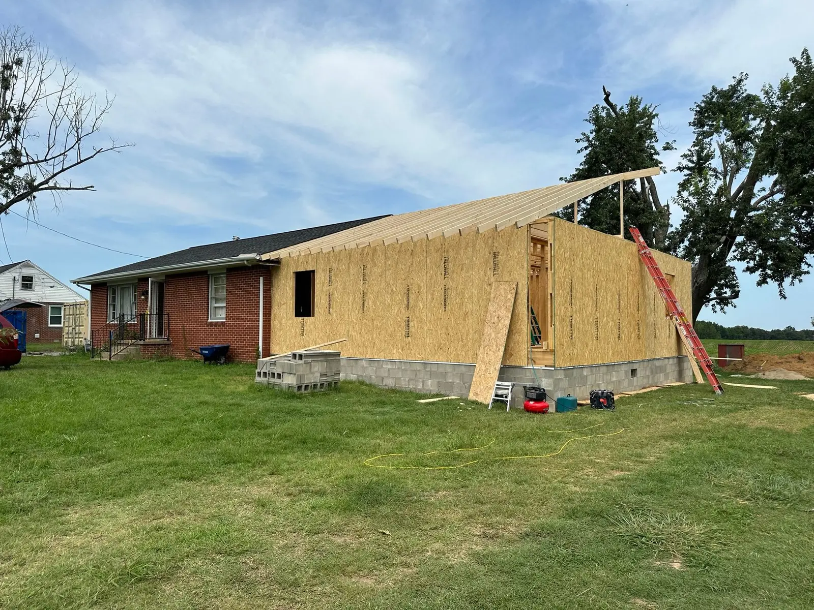 Storm-Damaged Brick Ranch Rebuilt with New Addition — Progress photo 47