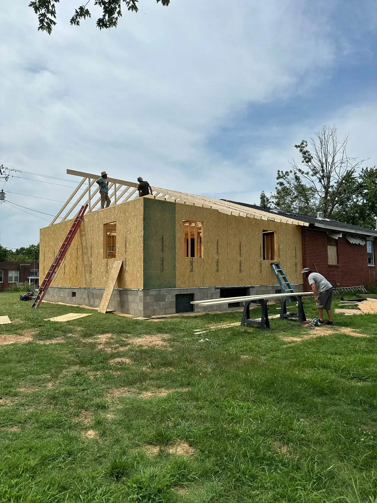 Storm-Damaged Brick Ranch Rebuilt with New Addition — Progress photo 48