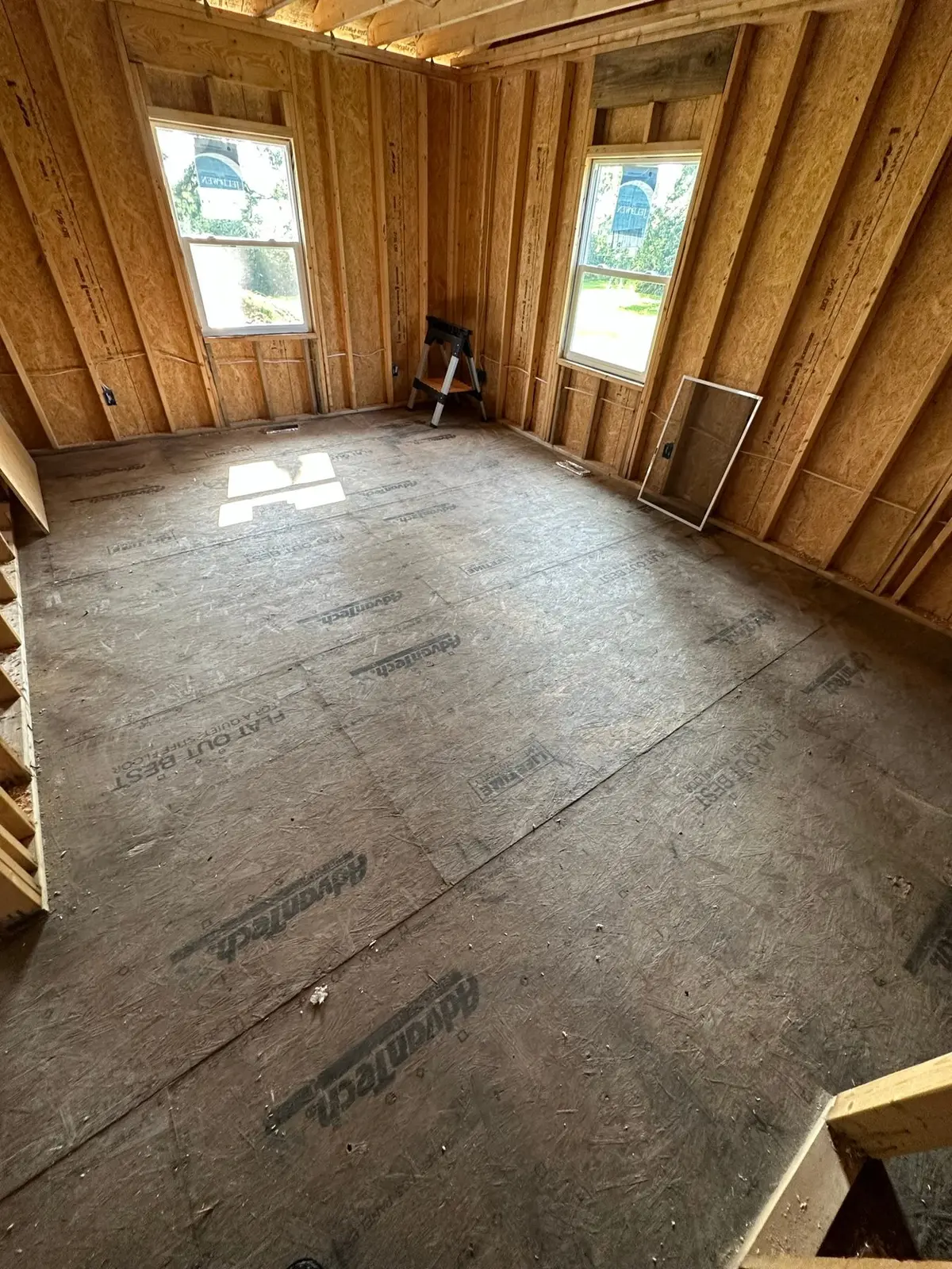 Storm-Damaged Brick Ranch Rebuilt with New Addition — Progress photo 63