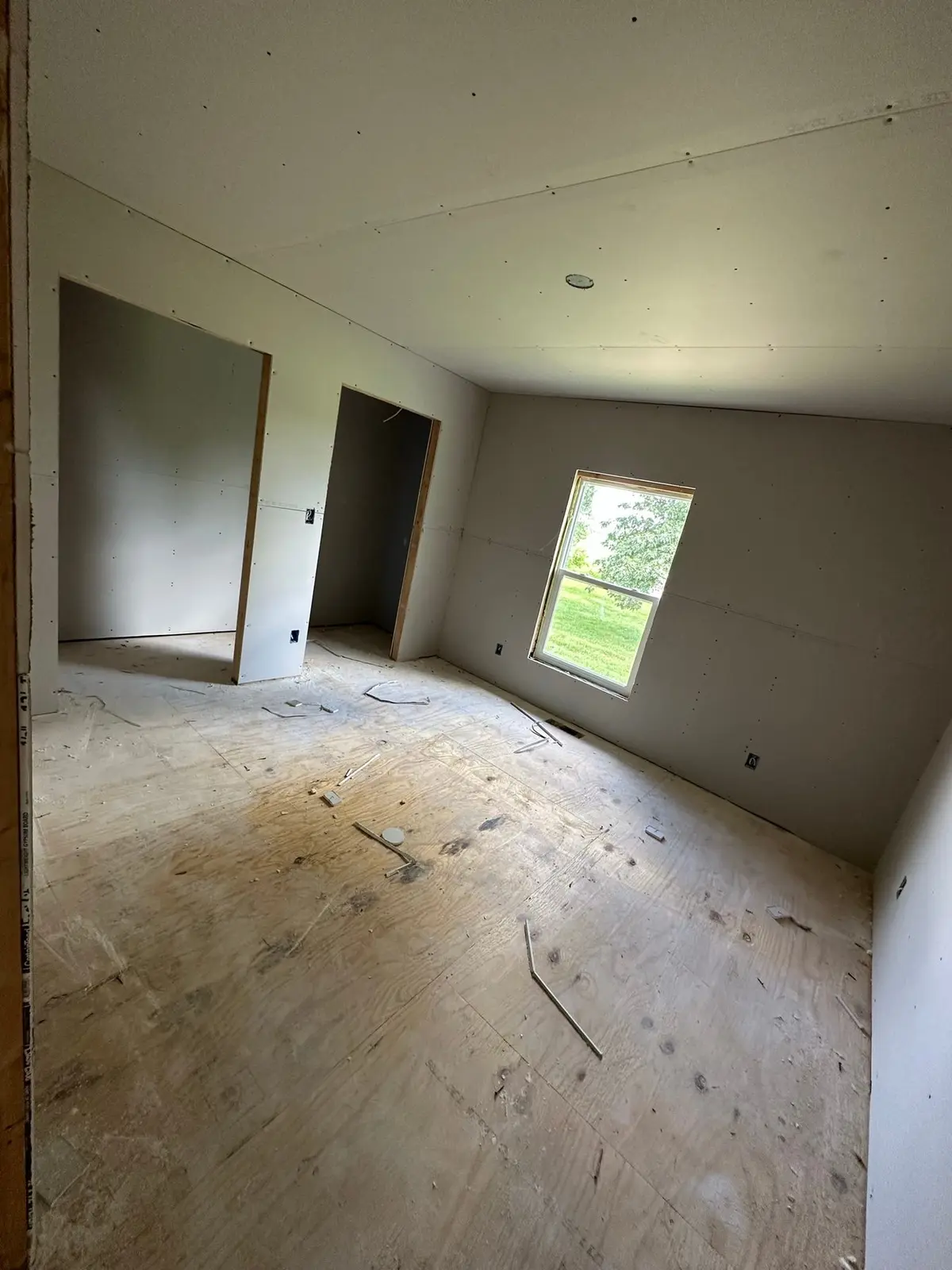 Storm-Damaged Brick Ranch Rebuilt with New Addition — Progress photo 78