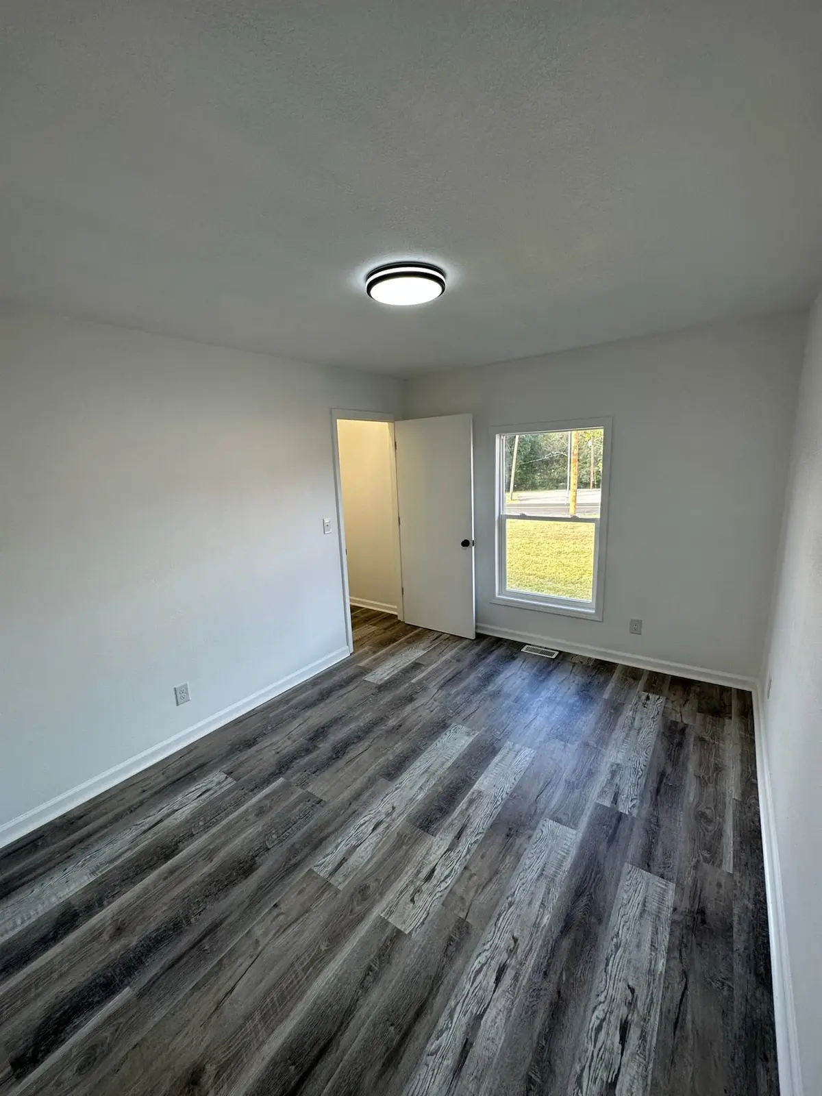 Storm-Damaged Brick Ranch Rebuilt with New Addition — finished photo 9