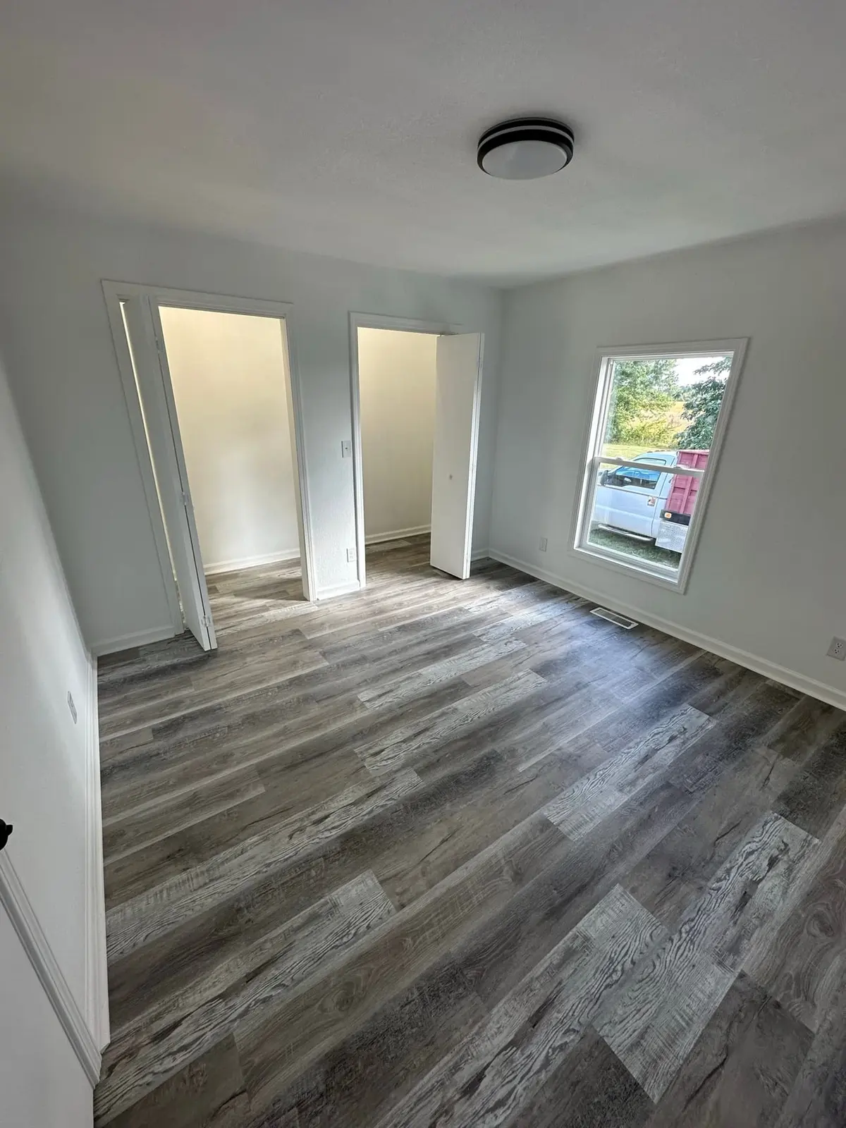 Storm-Damaged Brick Ranch Rebuilt with New Addition — finished photo 16