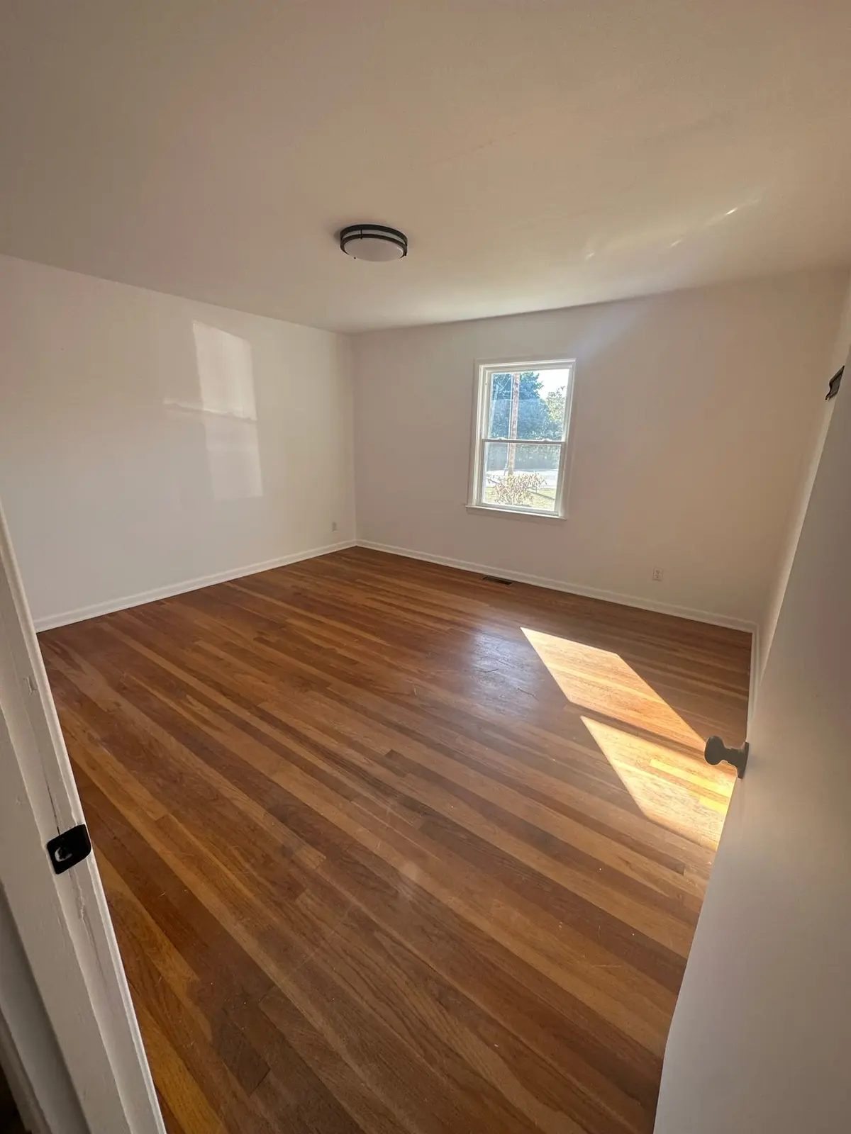 Storm-Damaged Brick Ranch Rebuilt with New Addition — finished photo 28