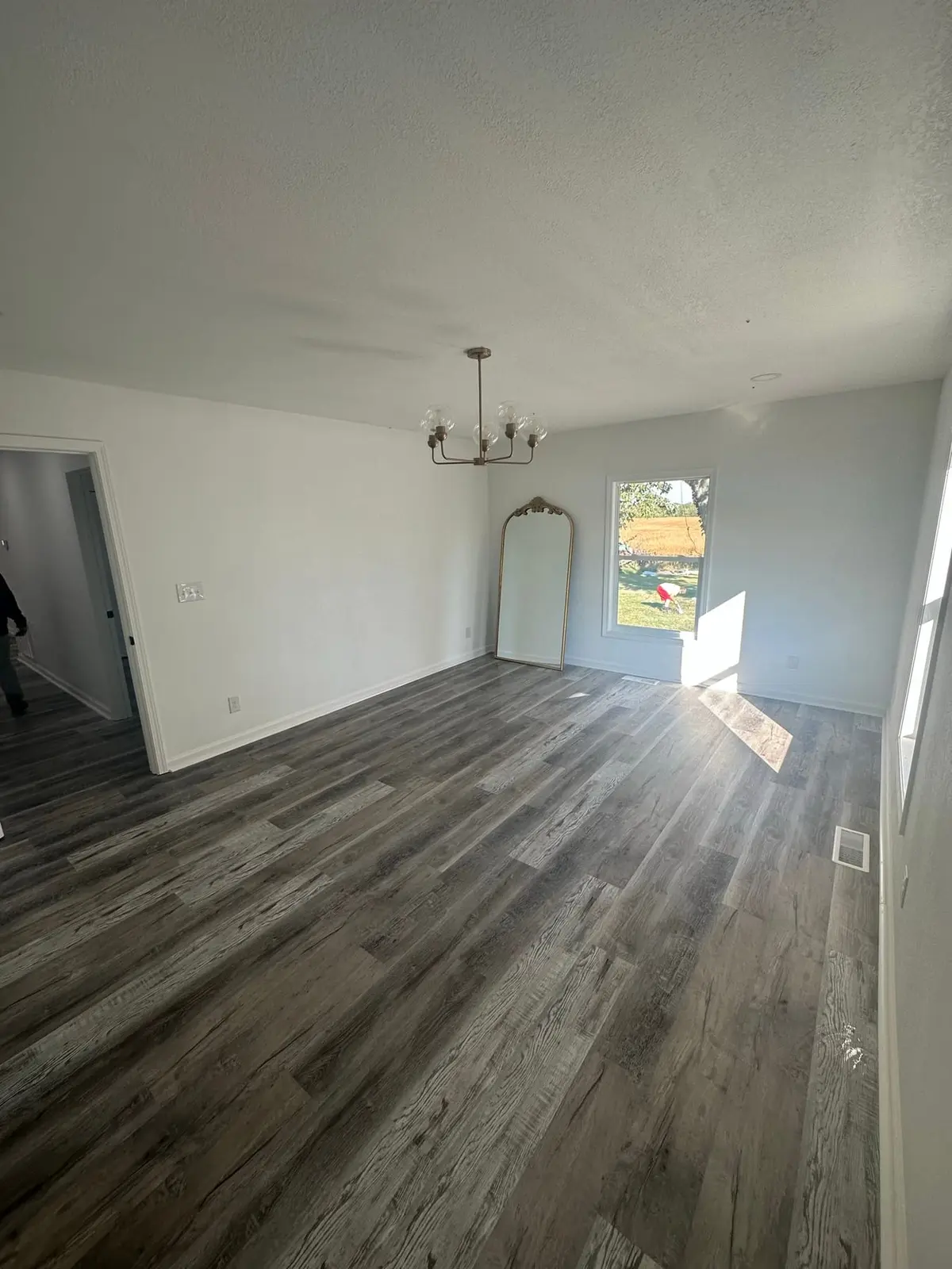 Storm-Damaged Brick Ranch Rebuilt with New Addition — finished photo 33