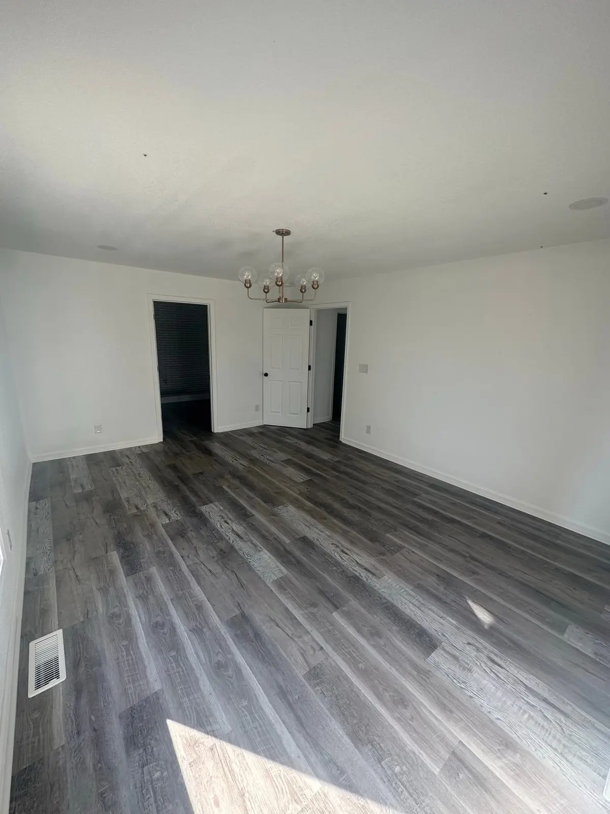 Storm-Damaged Brick Ranch Rebuilt with New Addition — finished photo 34