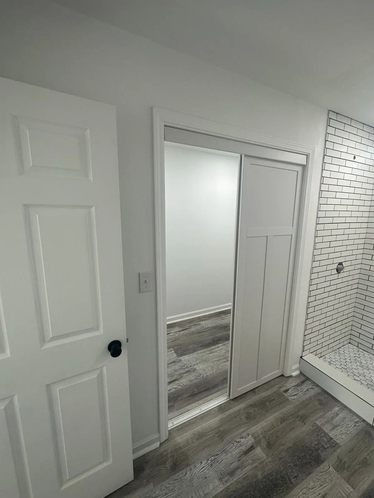 Storm-Damaged Brick Ranch Rebuilt with New Addition — finished photo 35