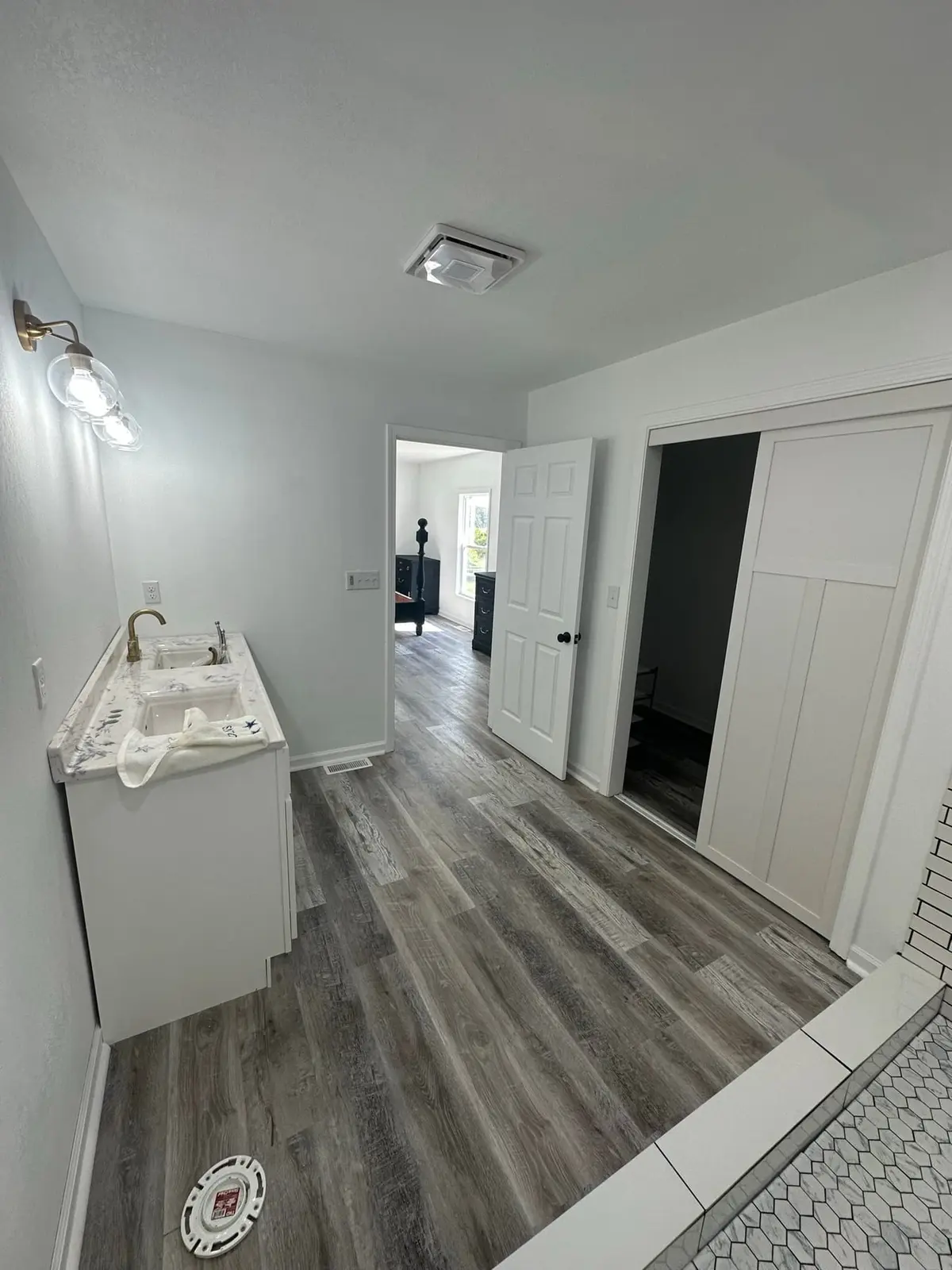 Storm-Damaged Brick Ranch Rebuilt with New Addition — finished photo 40