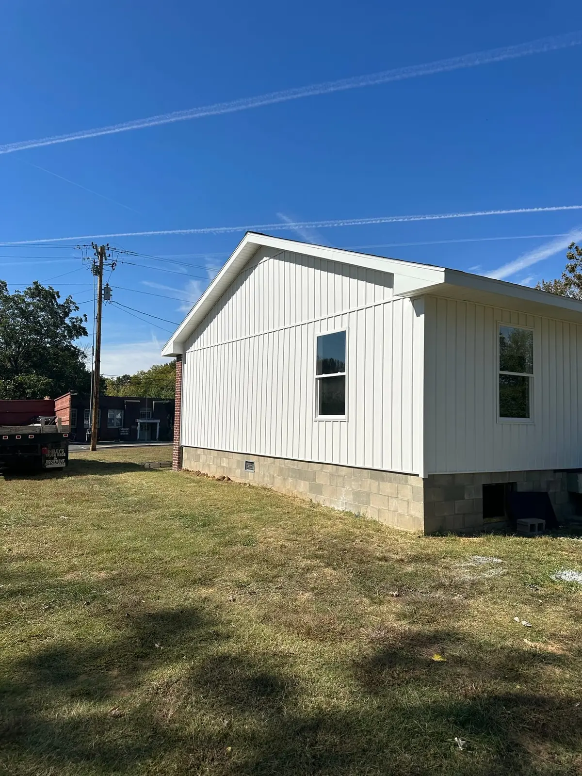 Storm-Damaged Brick Ranch Rebuilt with New Addition — finished photo 10