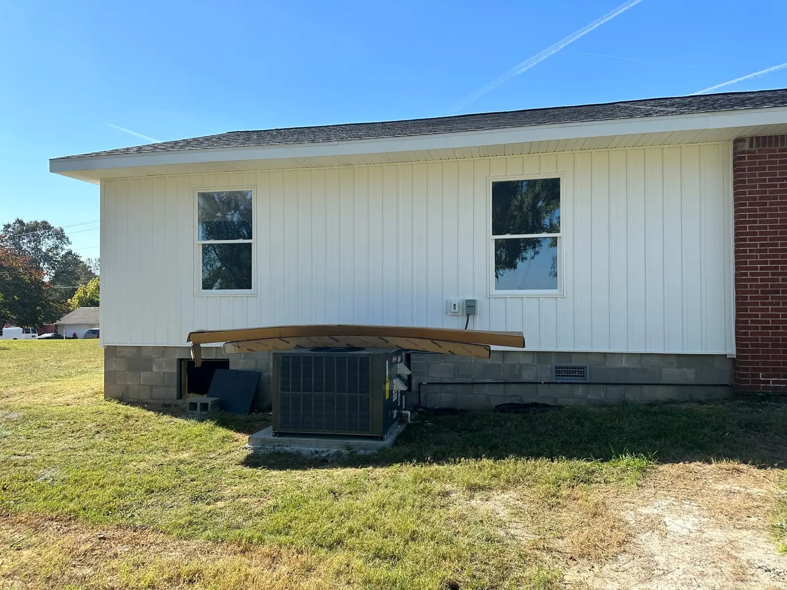 Storm-Damaged Brick Ranch Rebuilt with New Addition — finished photo 3