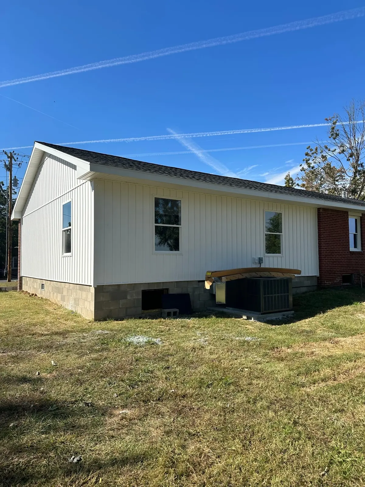 Storm-Damaged Brick Ranch Rebuilt with New Addition