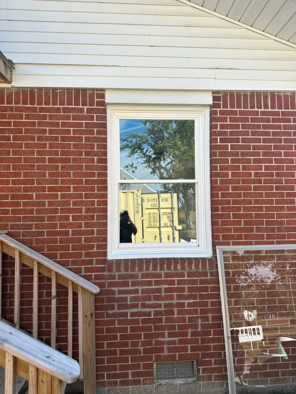 Storm-Damaged Brick Ranch Rebuilt with New Addition — finished photo 48