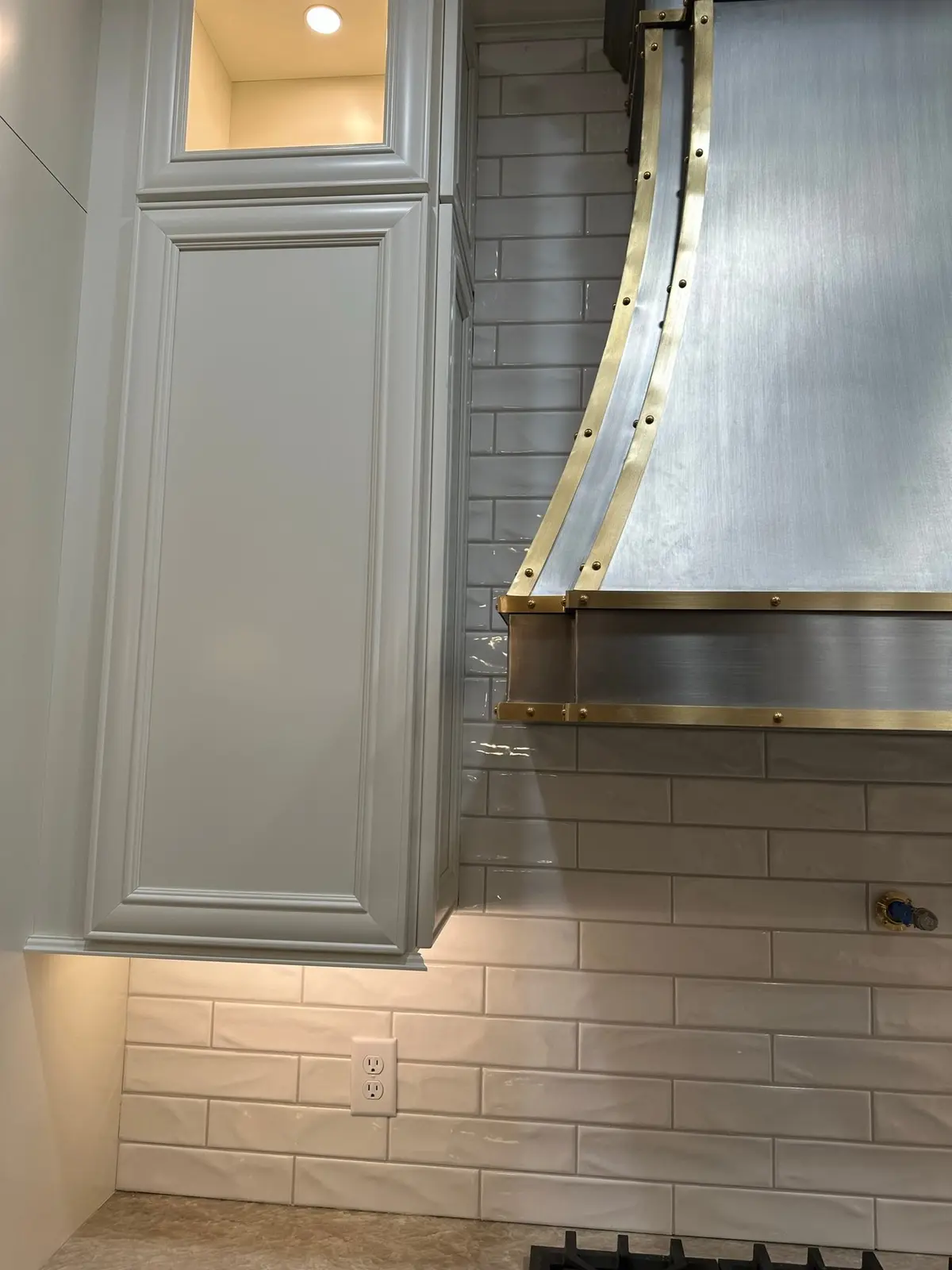 Kitchen Remodel with White Tile & Range Hood — finished photo 9